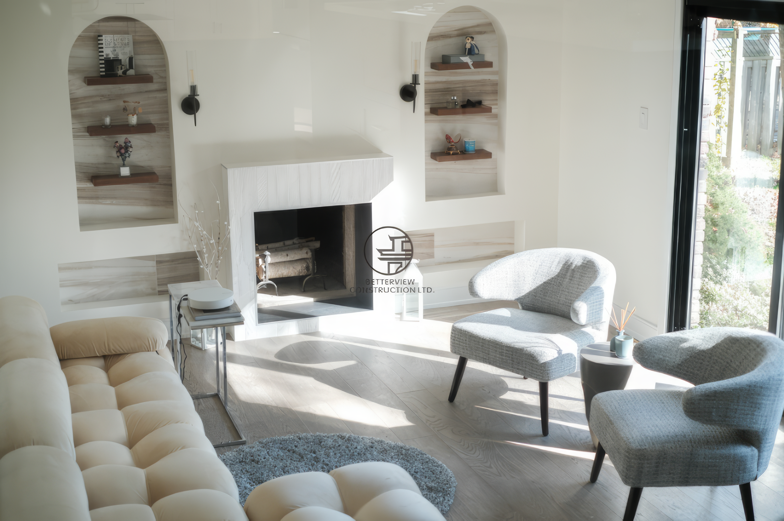 Modern living room renovation with fireplace feature wall, built-in shelving niches, and contemporary seating area in a Toronto home.