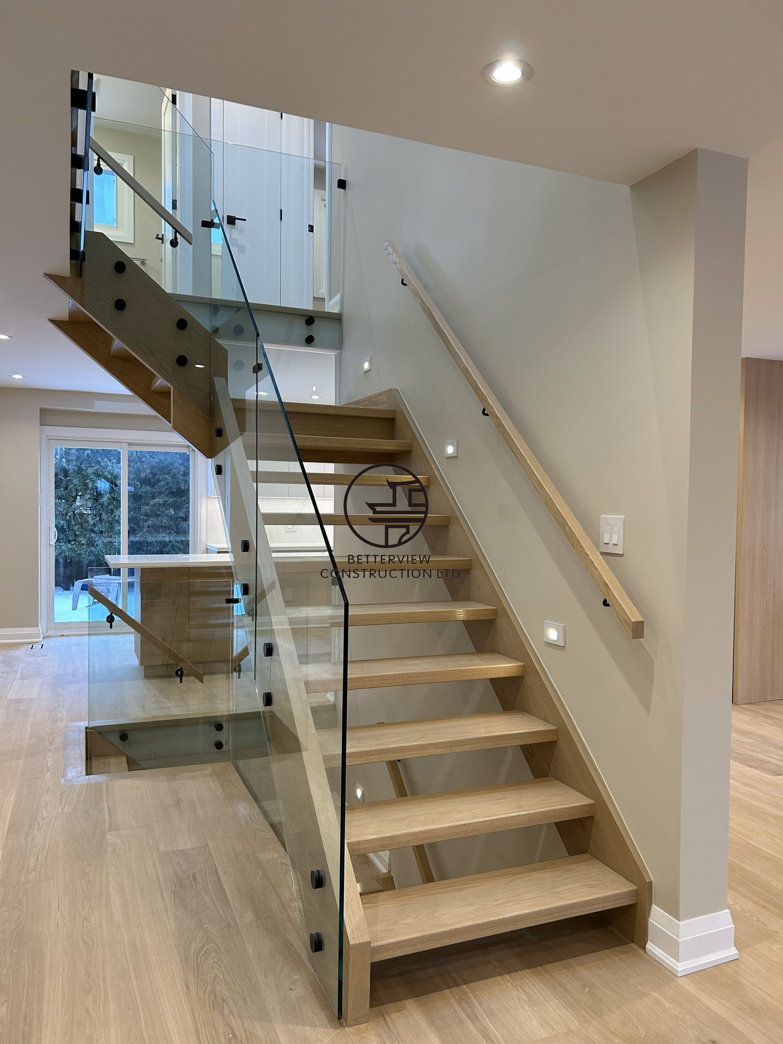 custom-floating-staircase-glass-railing-renovation.png.png