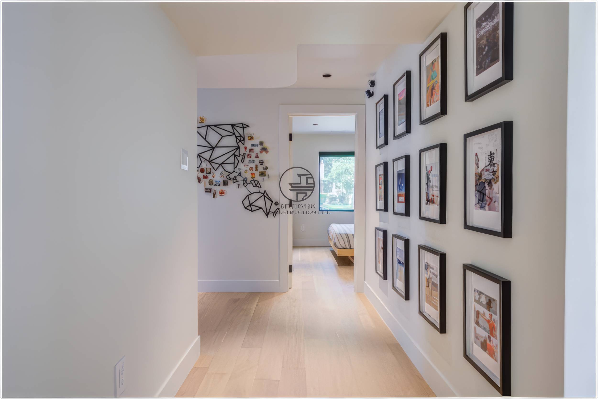 modern hallway with gallery wall and framed artwork