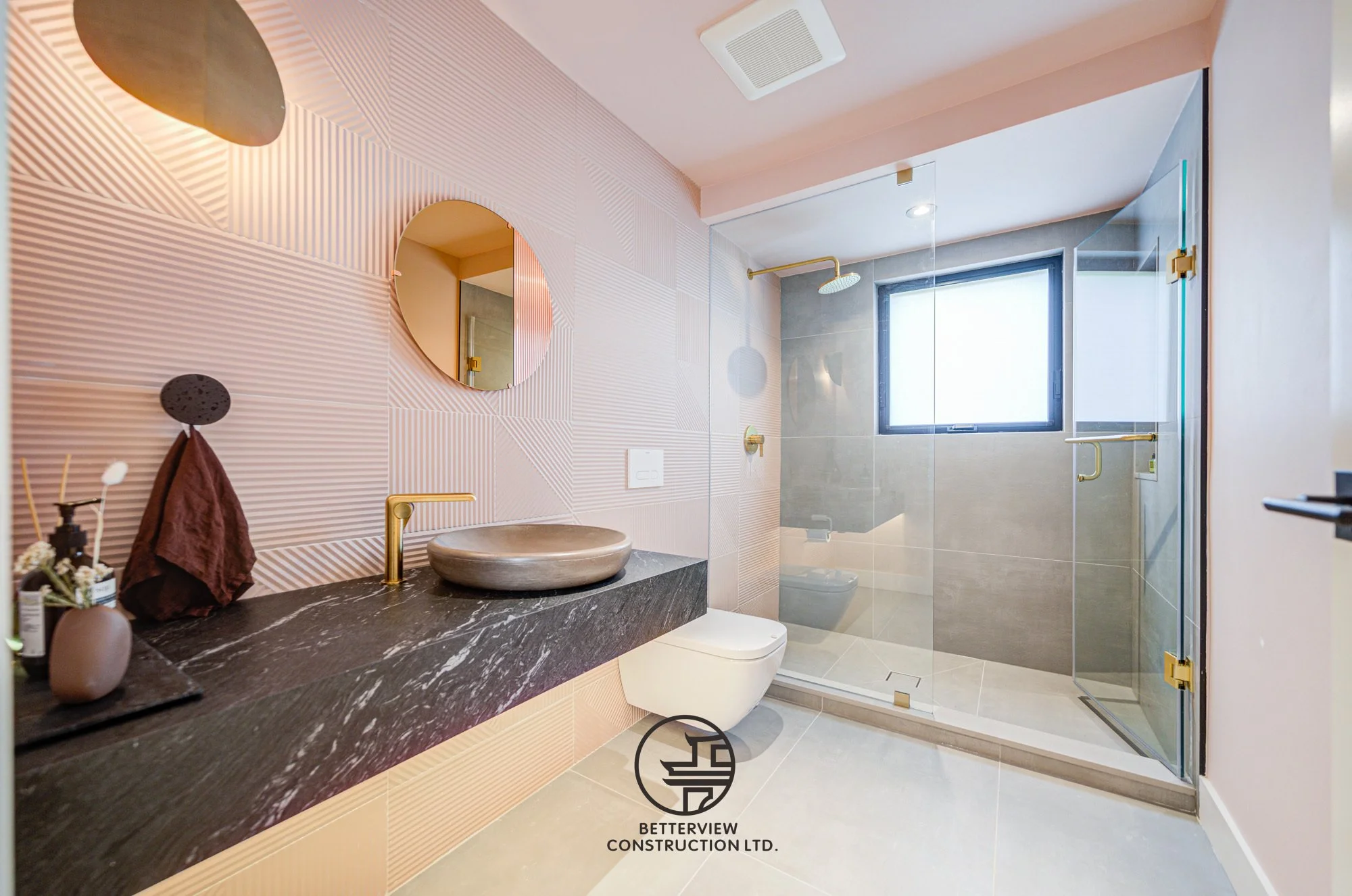 modern bathroom vanity with vessel sink and glass shower