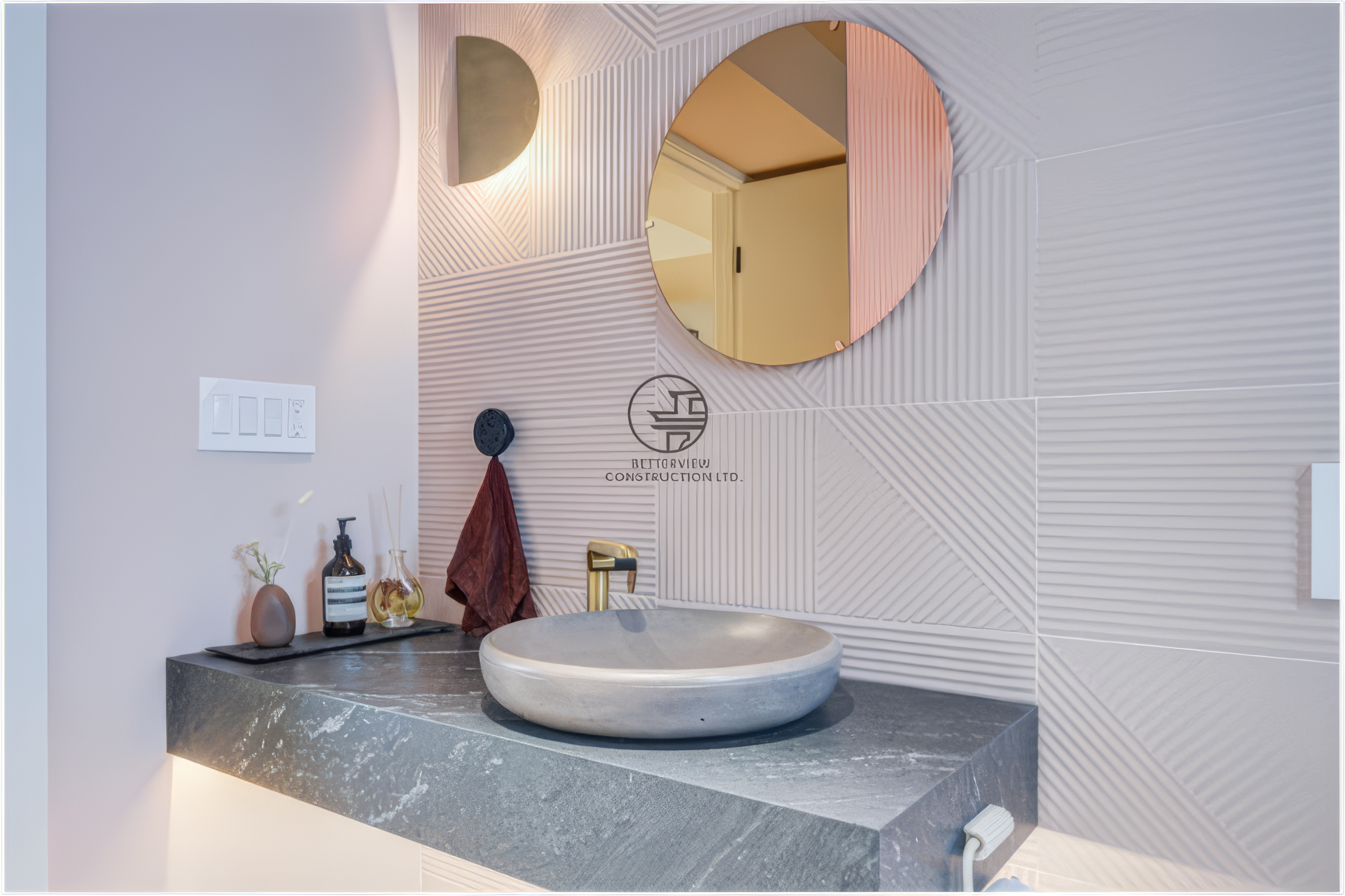 modern bathroom vanity with vessel sink and round mirror