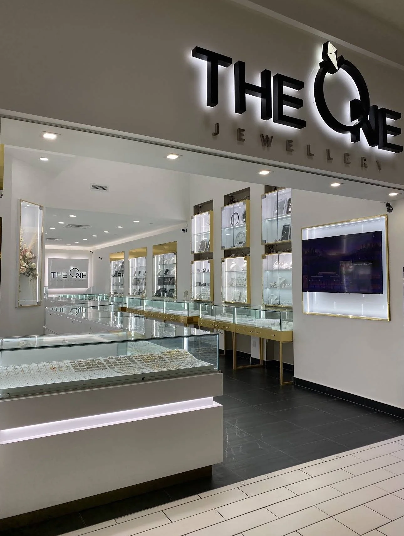 Retail store interior layout with custom counters and display wall design
