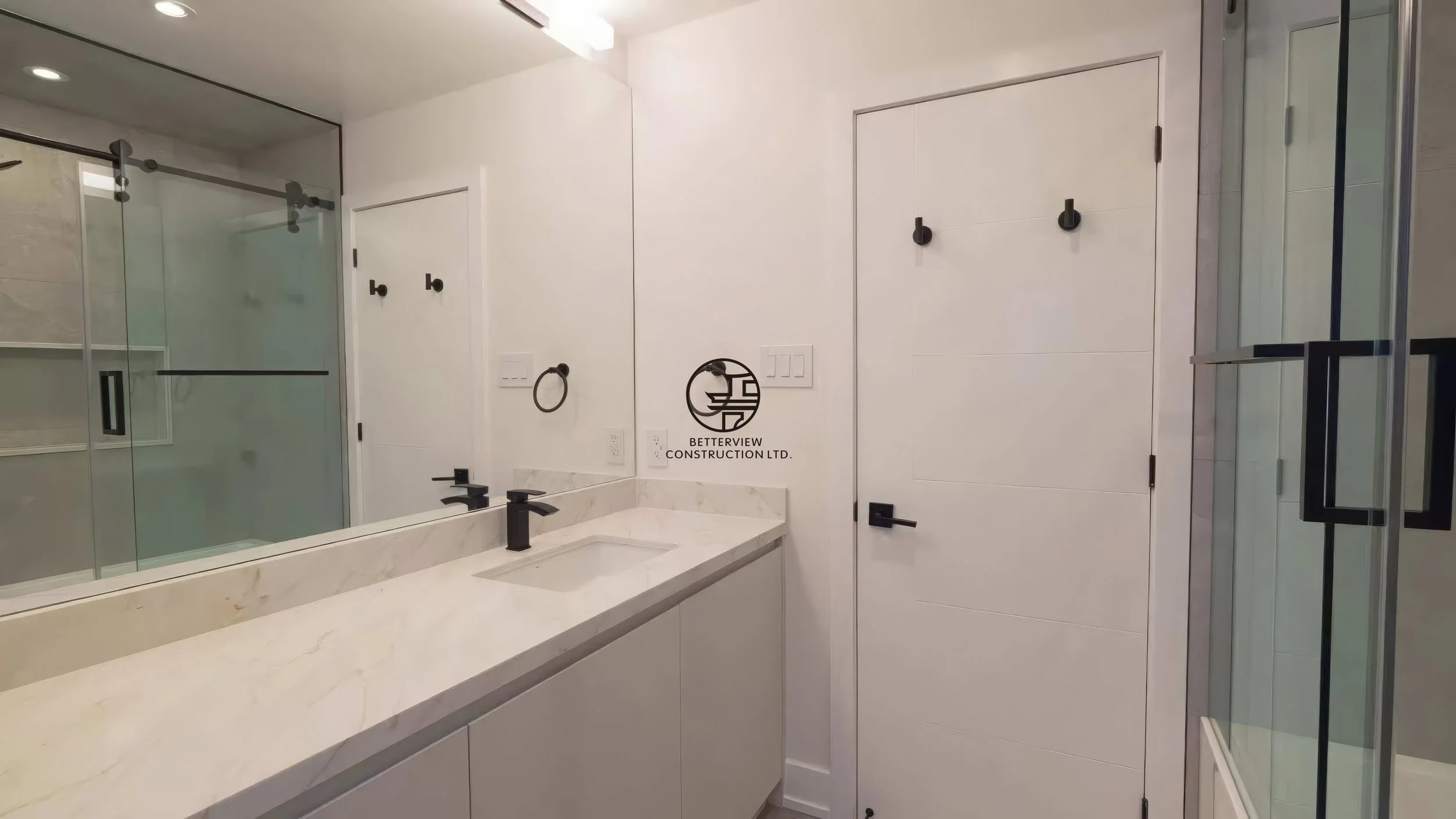 modern-bathroom-renovation-double-vanity-glass-shower-black-fixtures-toronto.jpg.jpg