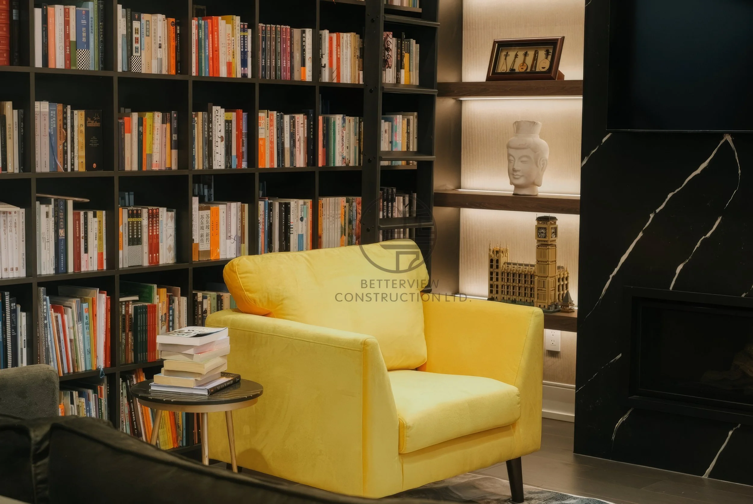modern-living-room-reading-corner-bookshelf-yellow-armchair.jpg.jpg