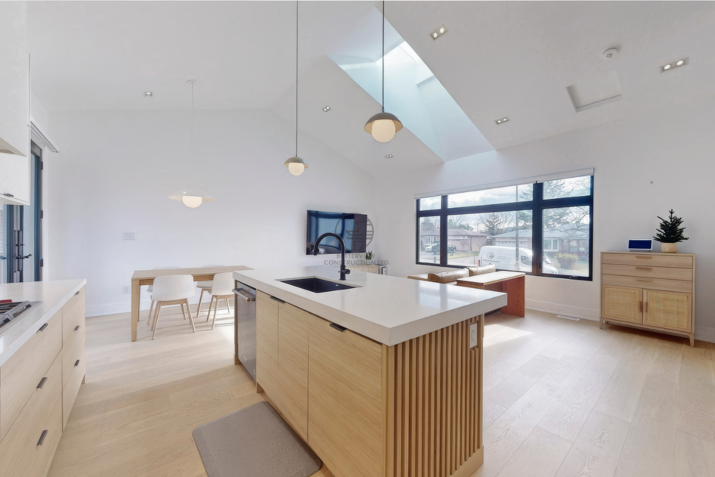 home-renovation-completed-open-concept-kitchen-skylight-view.jpg.png