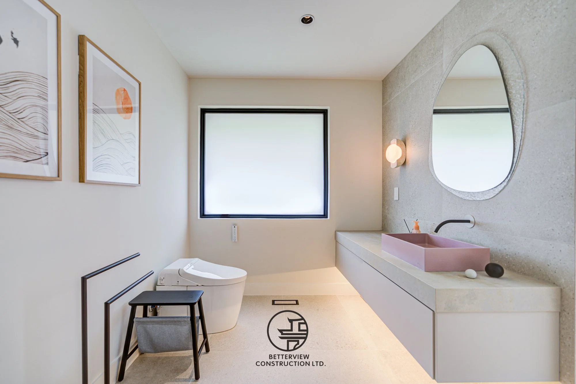 modern bathroom vanity with round mirror and minimalist sink design