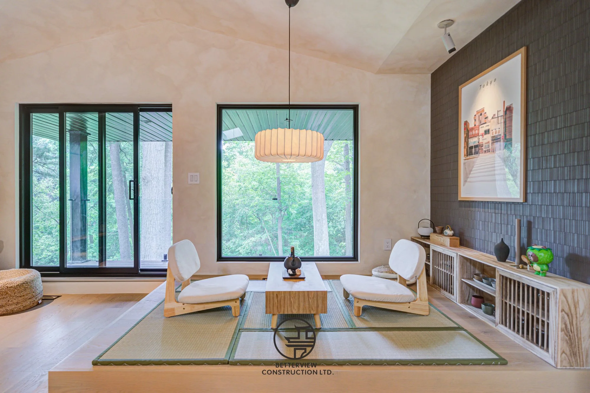 Japanese style tatami living room with low seating and large window