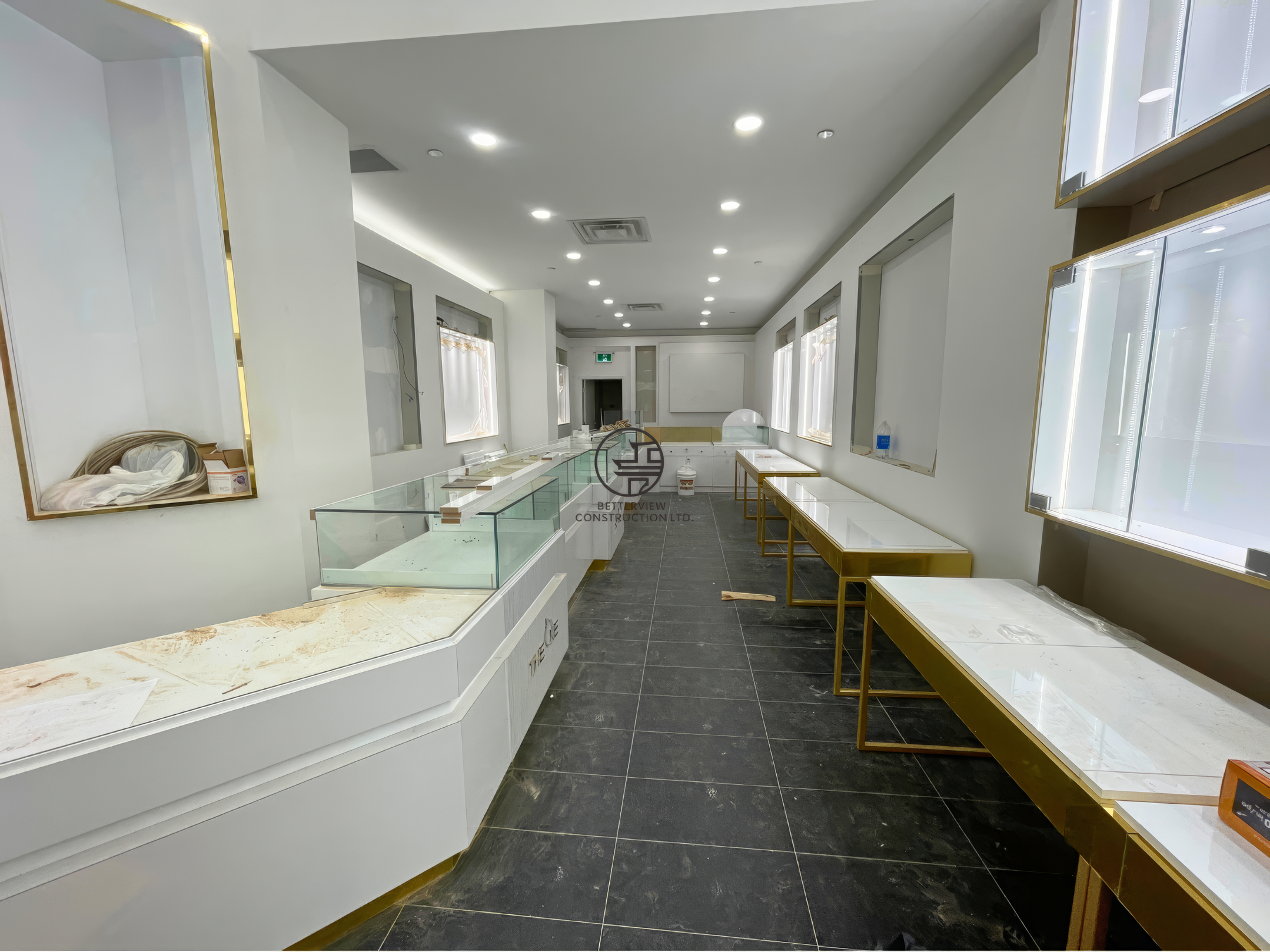 Luxury retail showroom interior with custom display counters and integrated lighting after commercial renovation in Toronto