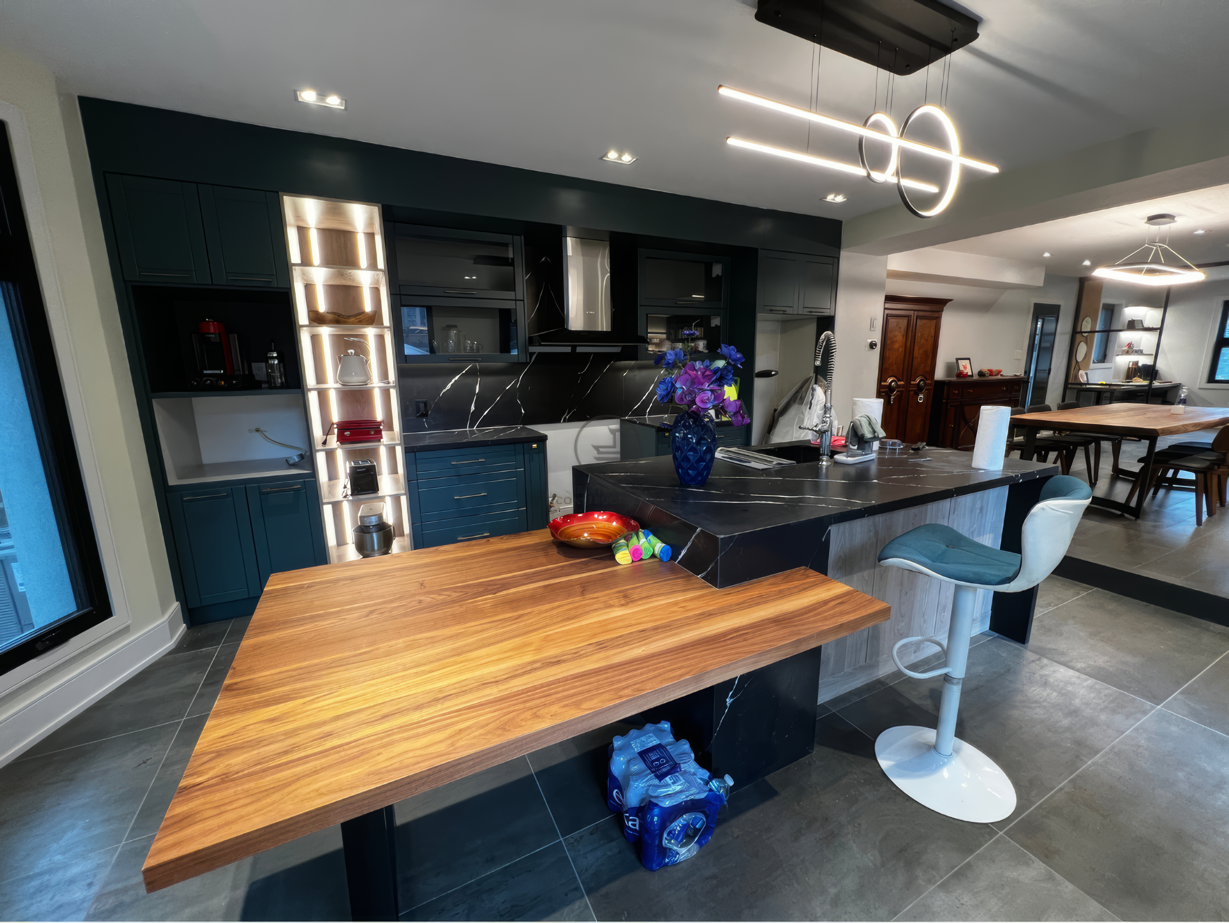 modern-open-concept-kitchen-renovation-island-wood-extension.jpg.png