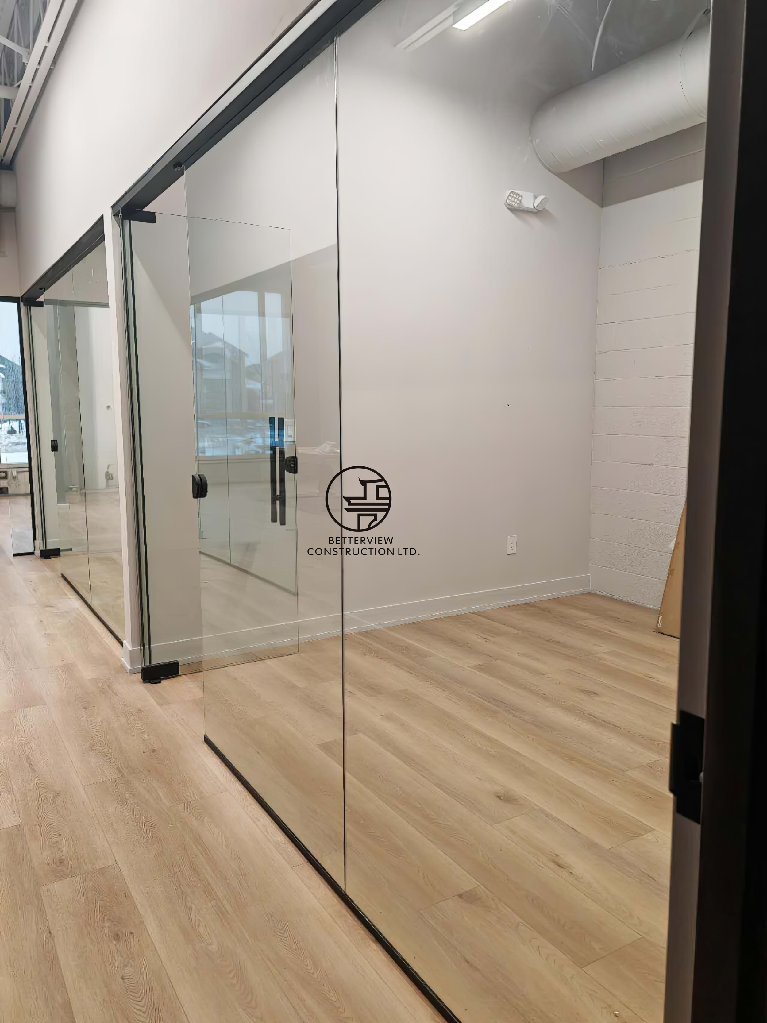 glass-office-partition-commercial-renovation.jpg.png