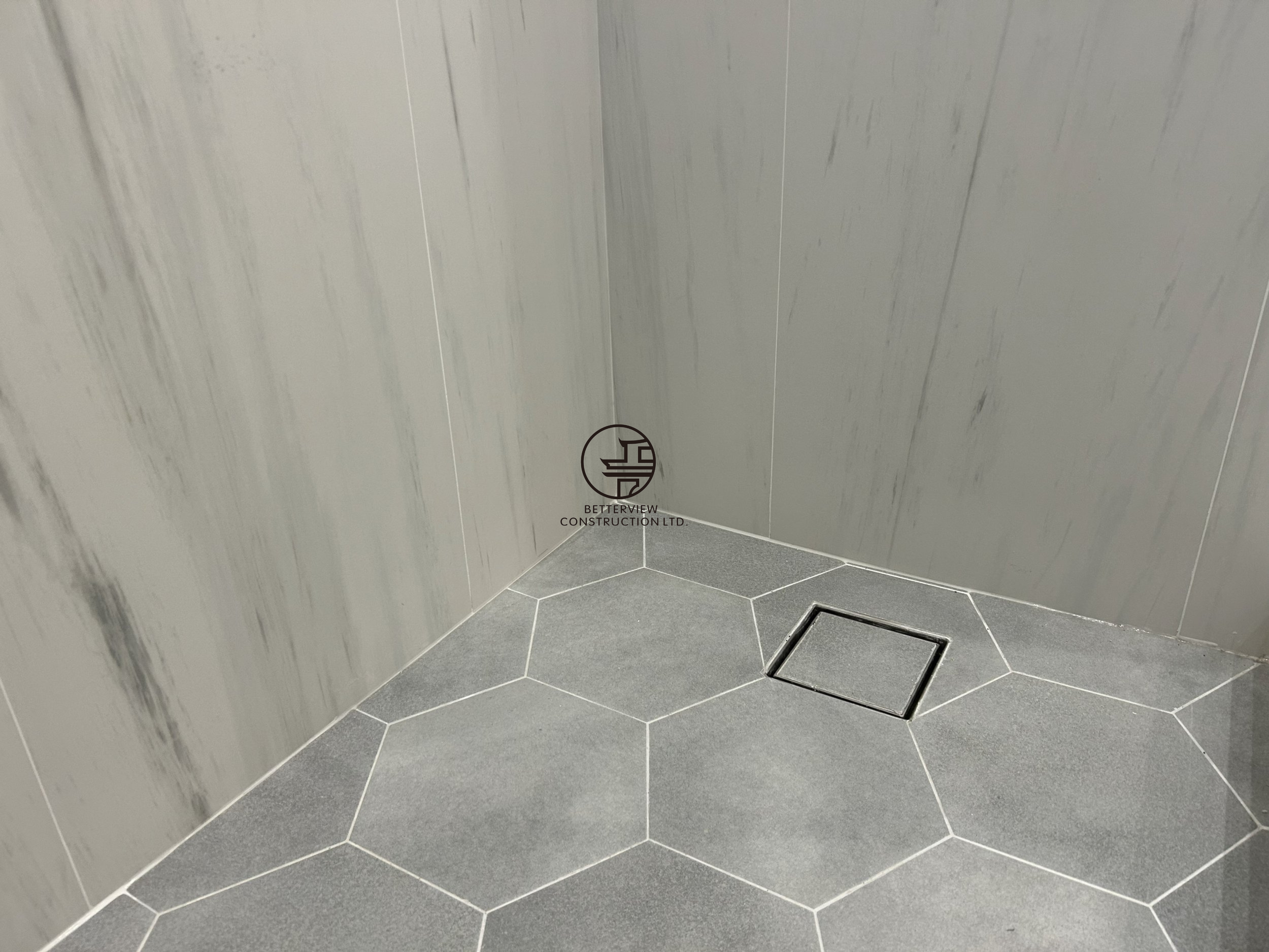 hexagon-tile-shower-floor-linear-drain-bathroom-renovation-toronto.jpg.png