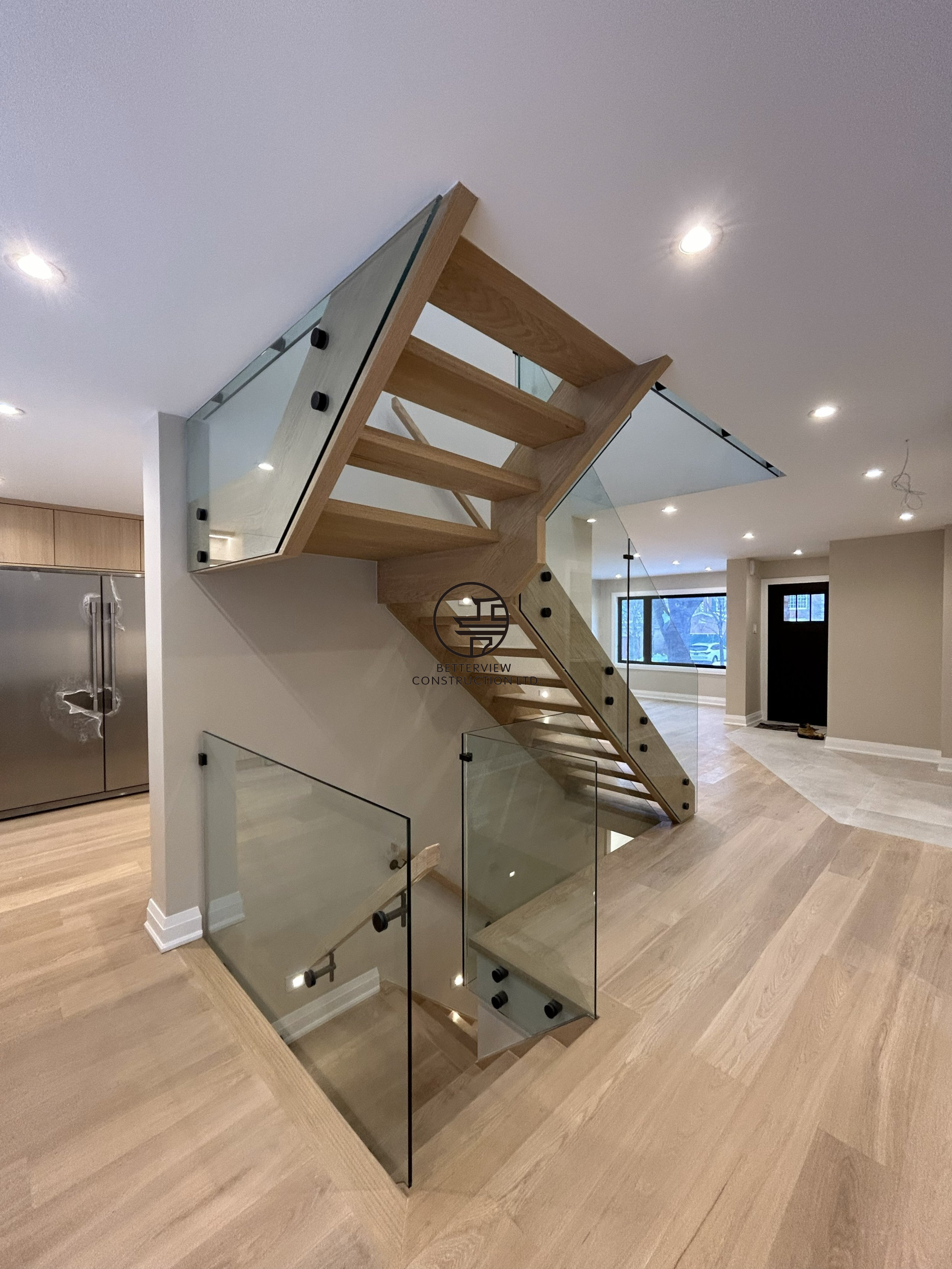 custom-glass-staircase-open-concept-renovation.png.png
