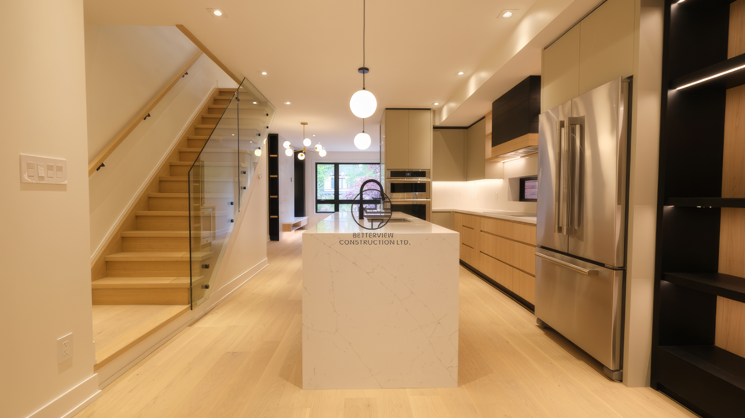 open-concept-home-renovation-kitchen-island-glass-staircase-toronto.jpg.png