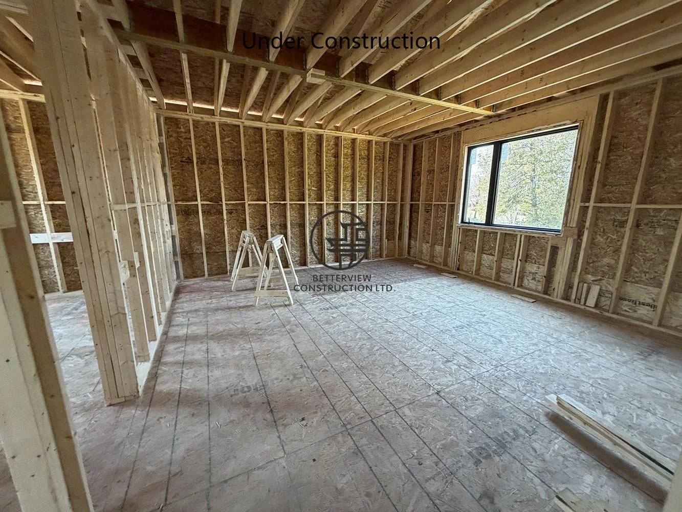 Spacious second floor addition framing designed for an open concept bedroom with large windows and abundant natural light.