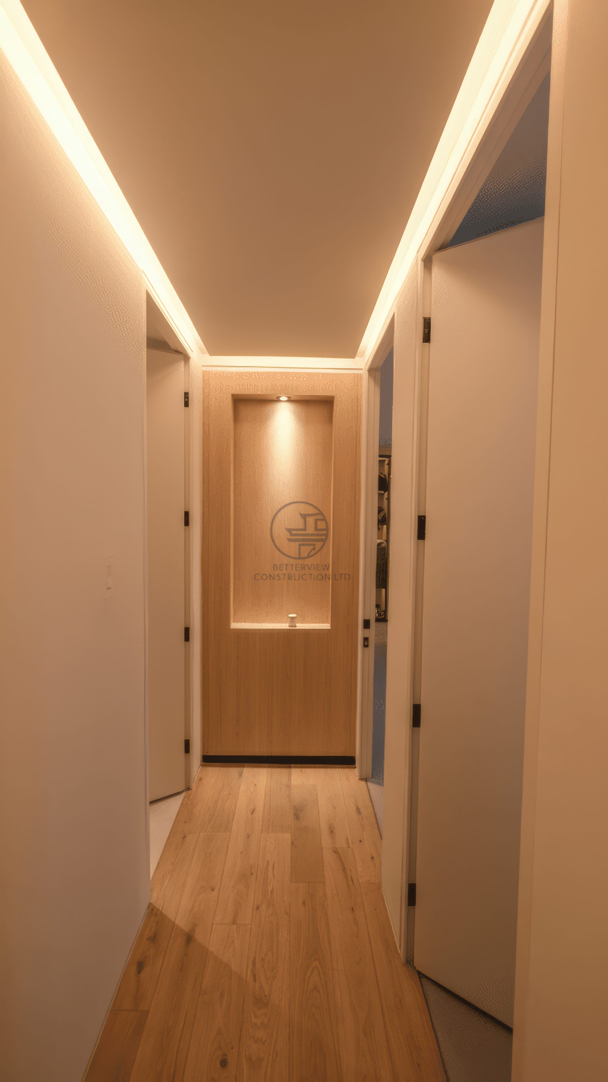 modern hallway with LED ceiling strip lighting in a Toronto condo renovation