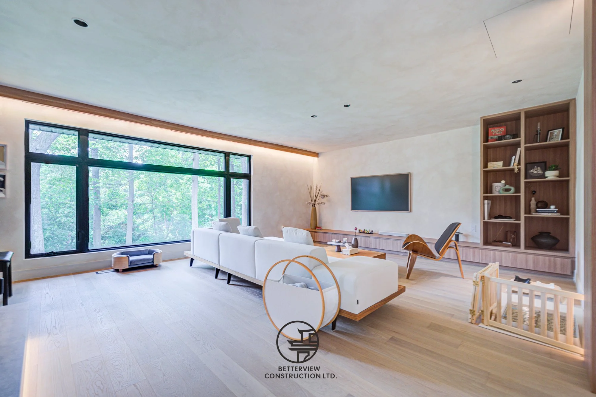 modern living room renovation with large windows and open concept design