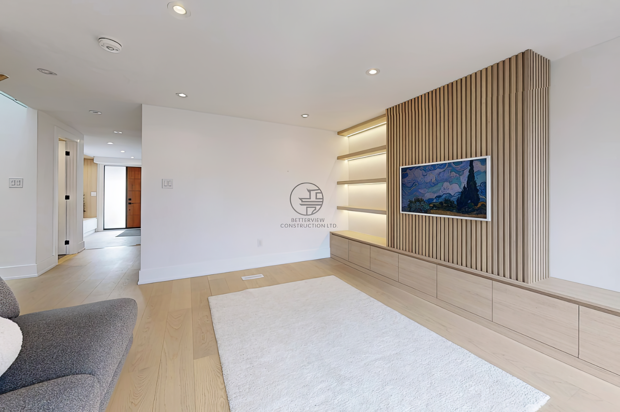 home-renovation-completed-living-room-feature-wall-built-in-storage.jpg.png