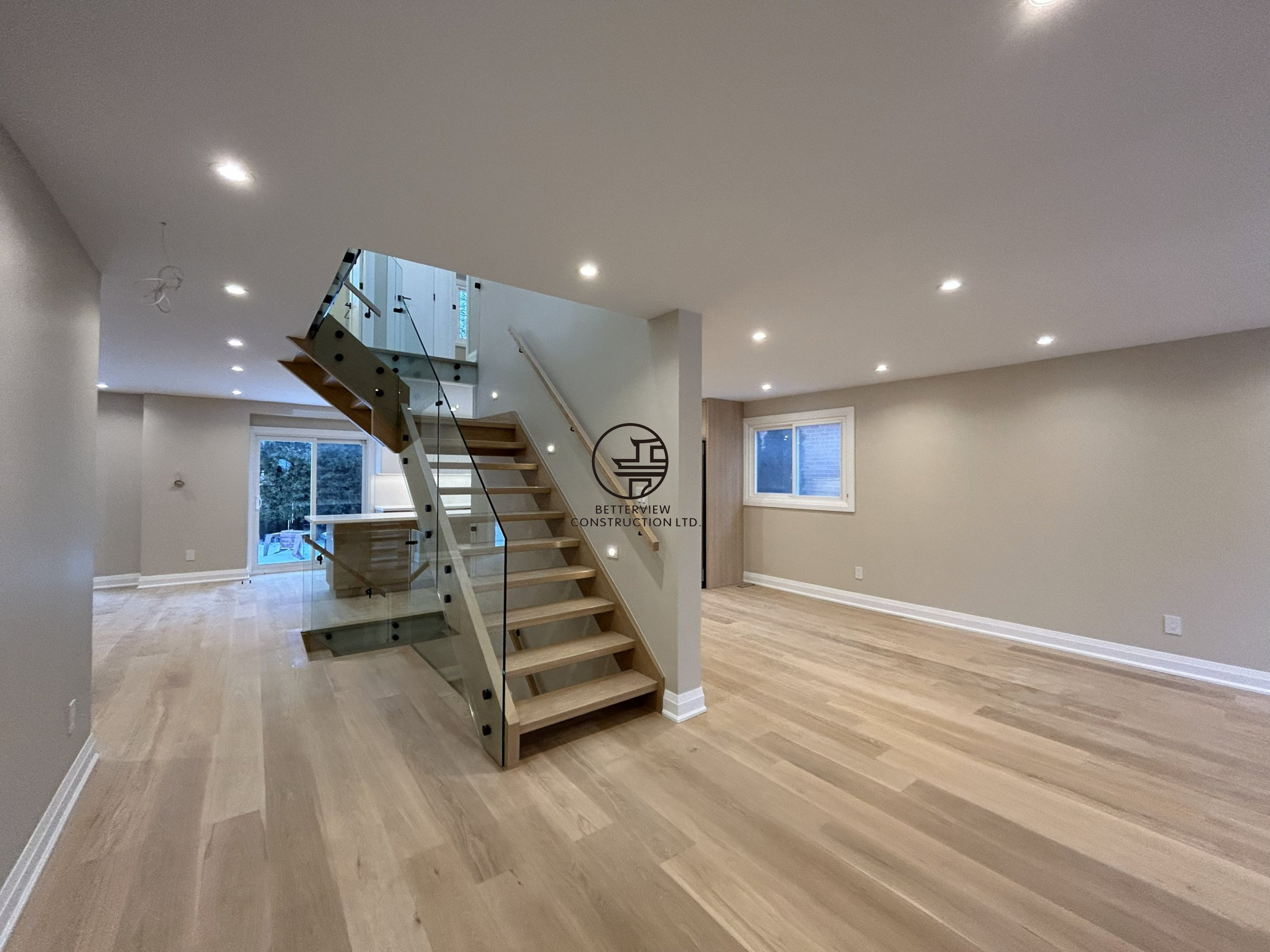 open-concept-glass-staircase-whole-home-renovation.png.png