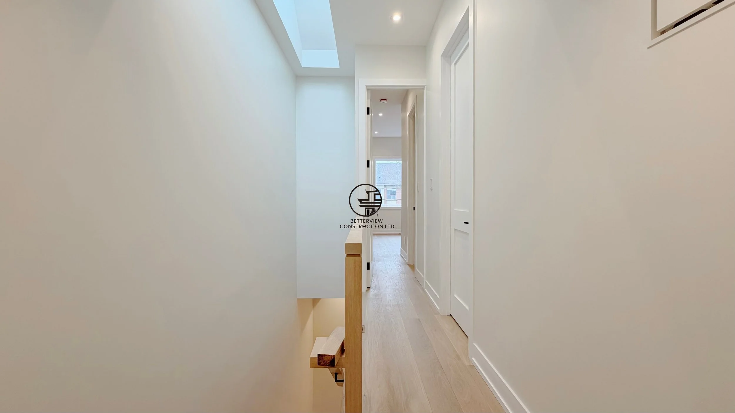 modern-home-hallway-staircase-skylight-hardwood-floor-renovation-toronto.jpg.jpg