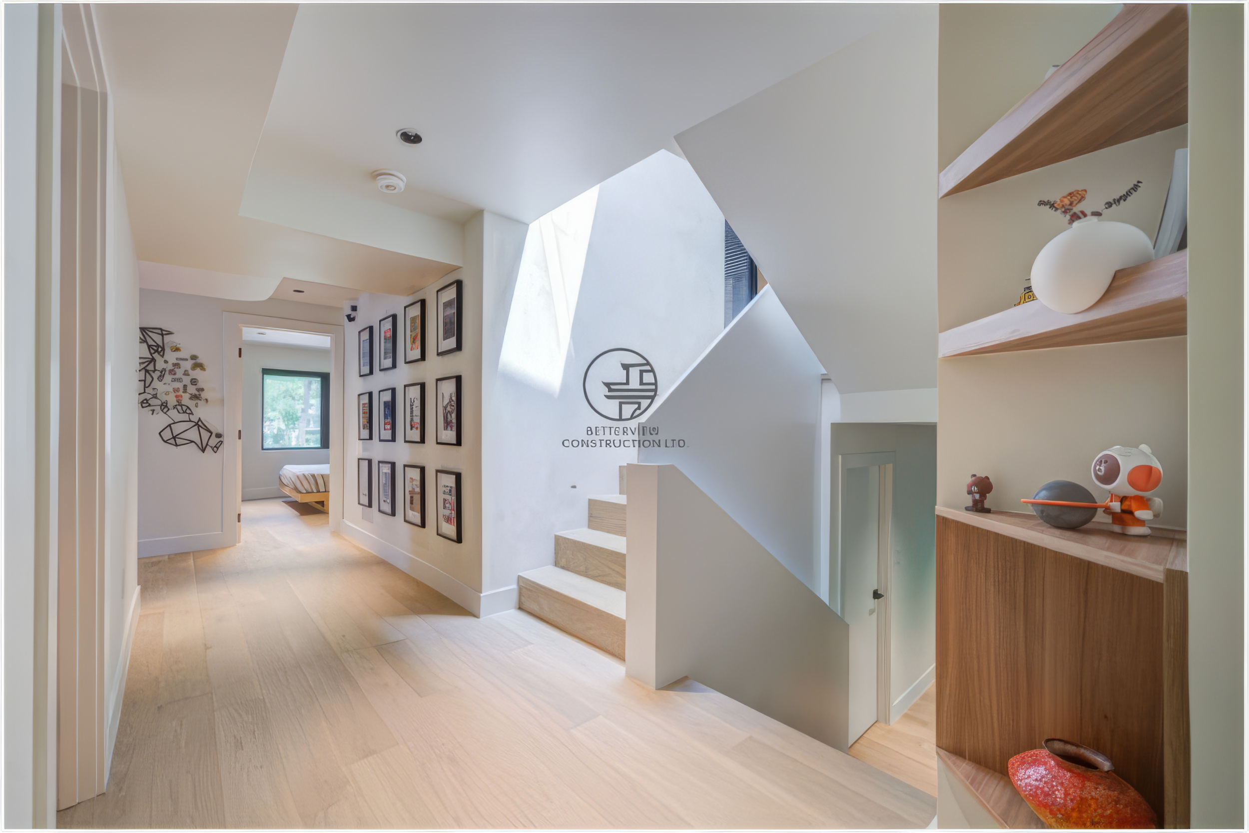 modern hallway with staircase and skylight