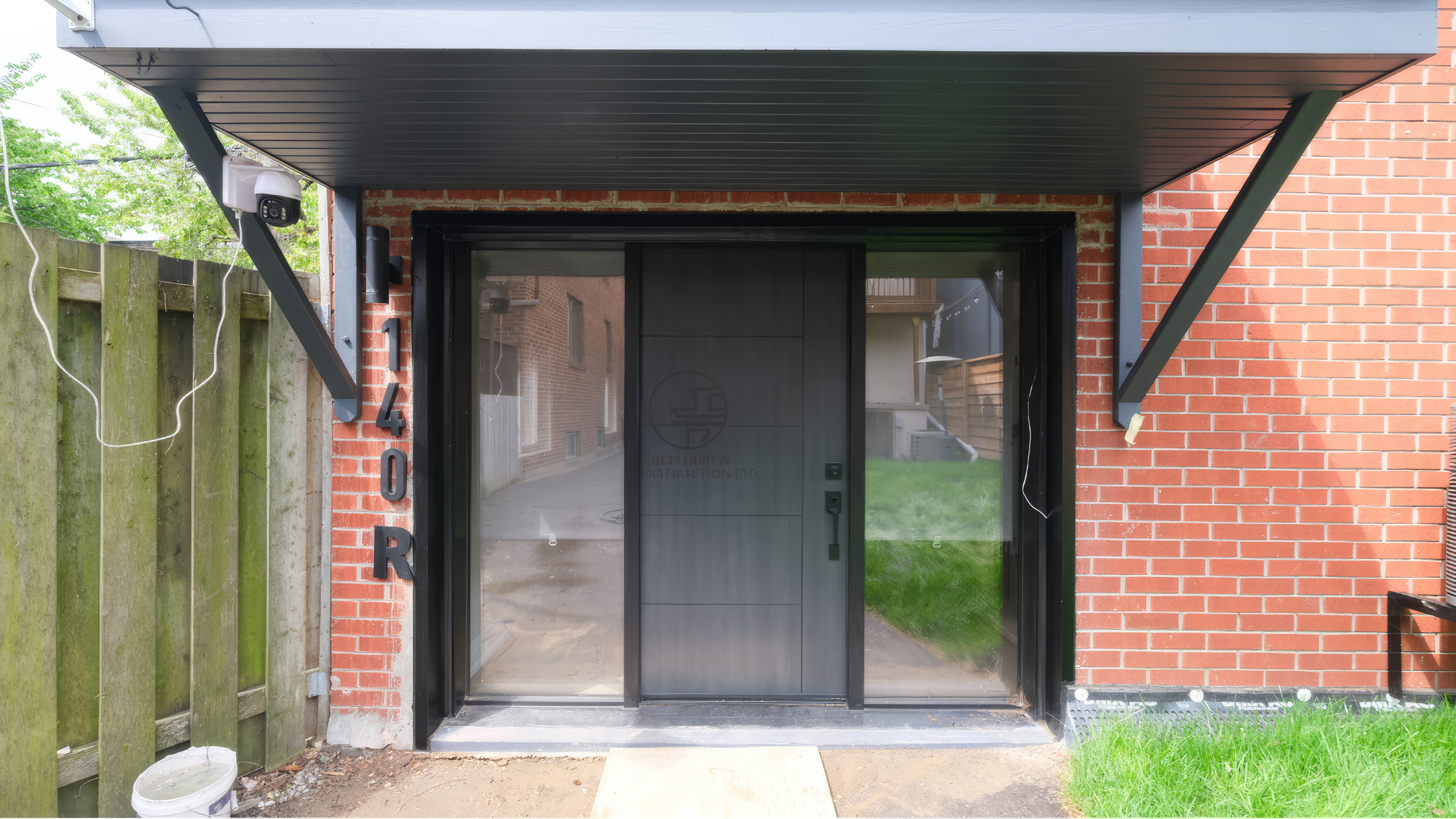 modern-black-front-entry-door-red-brick-house.jpg.png