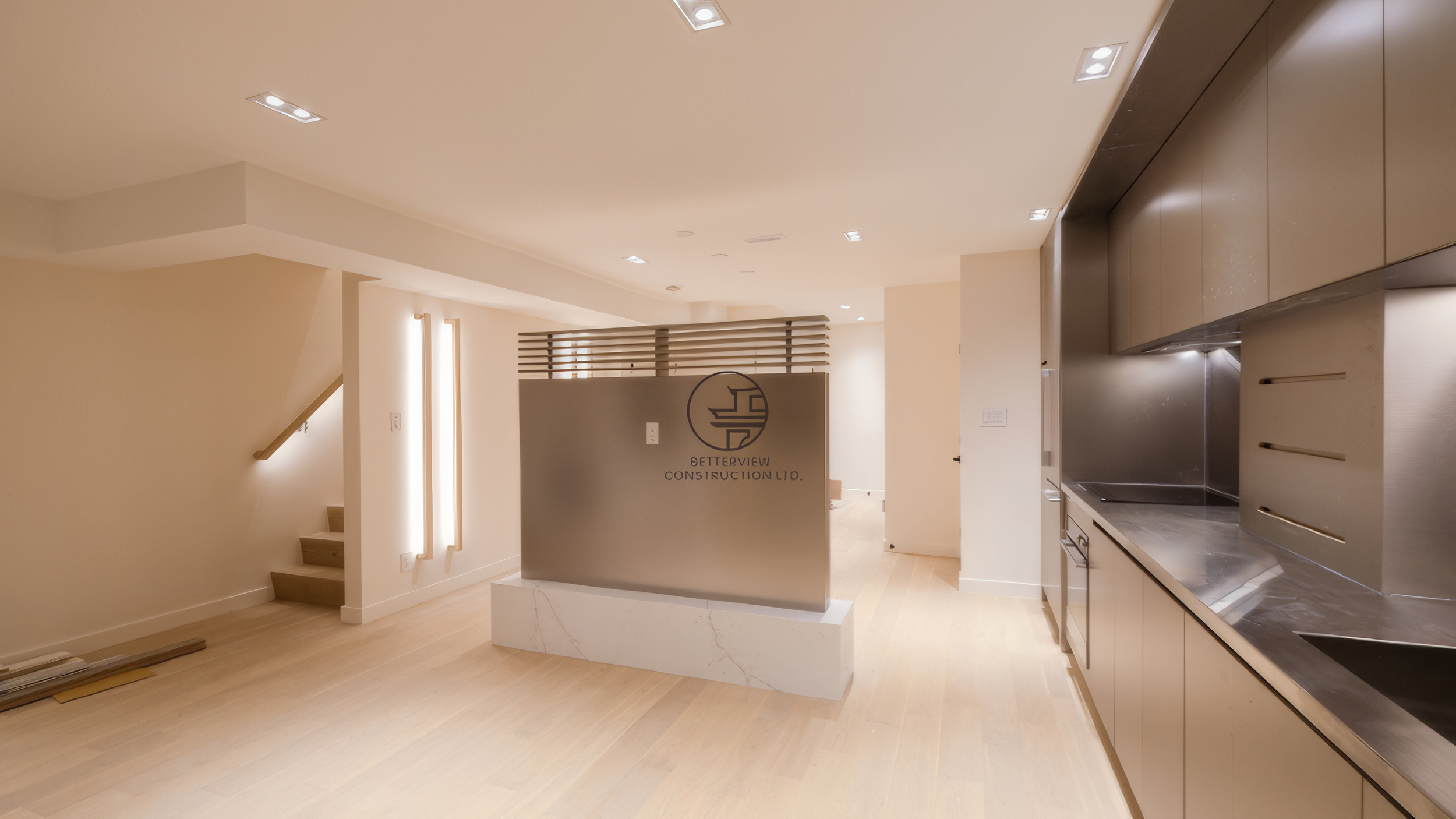 modern basement renovation with kitchen, island, staircase, and open concept layout