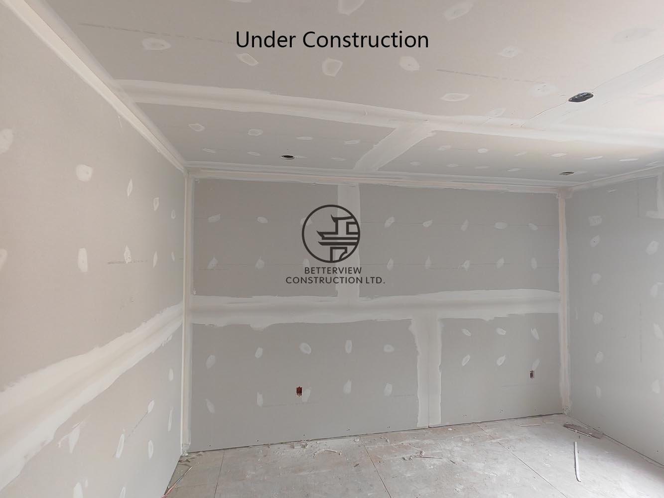 Drywall installation completed in the new addition, preparing the interior for painting, trim, and final finishes.