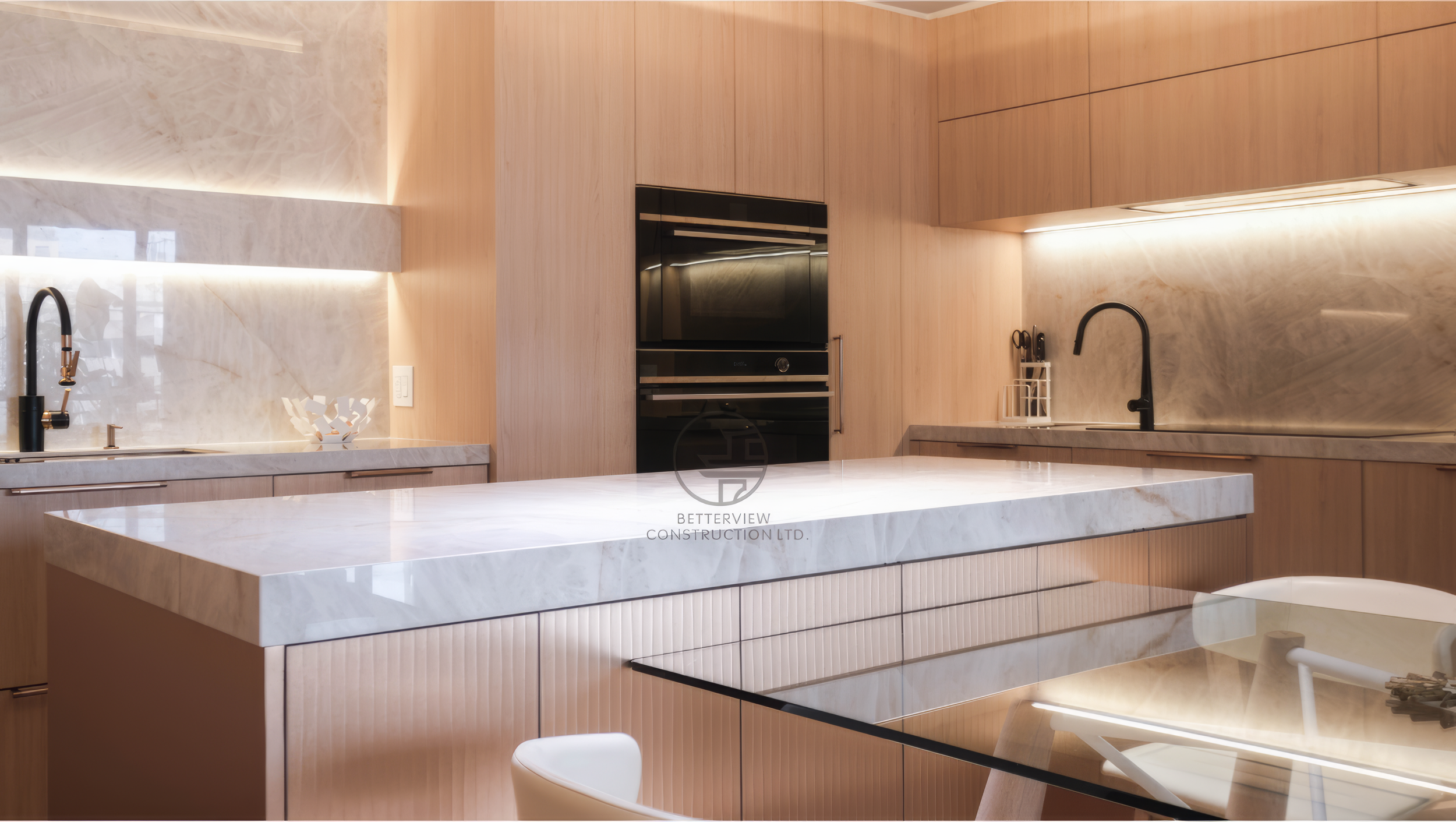 modern condo kitchen with marble waterfall island and wood cabinets