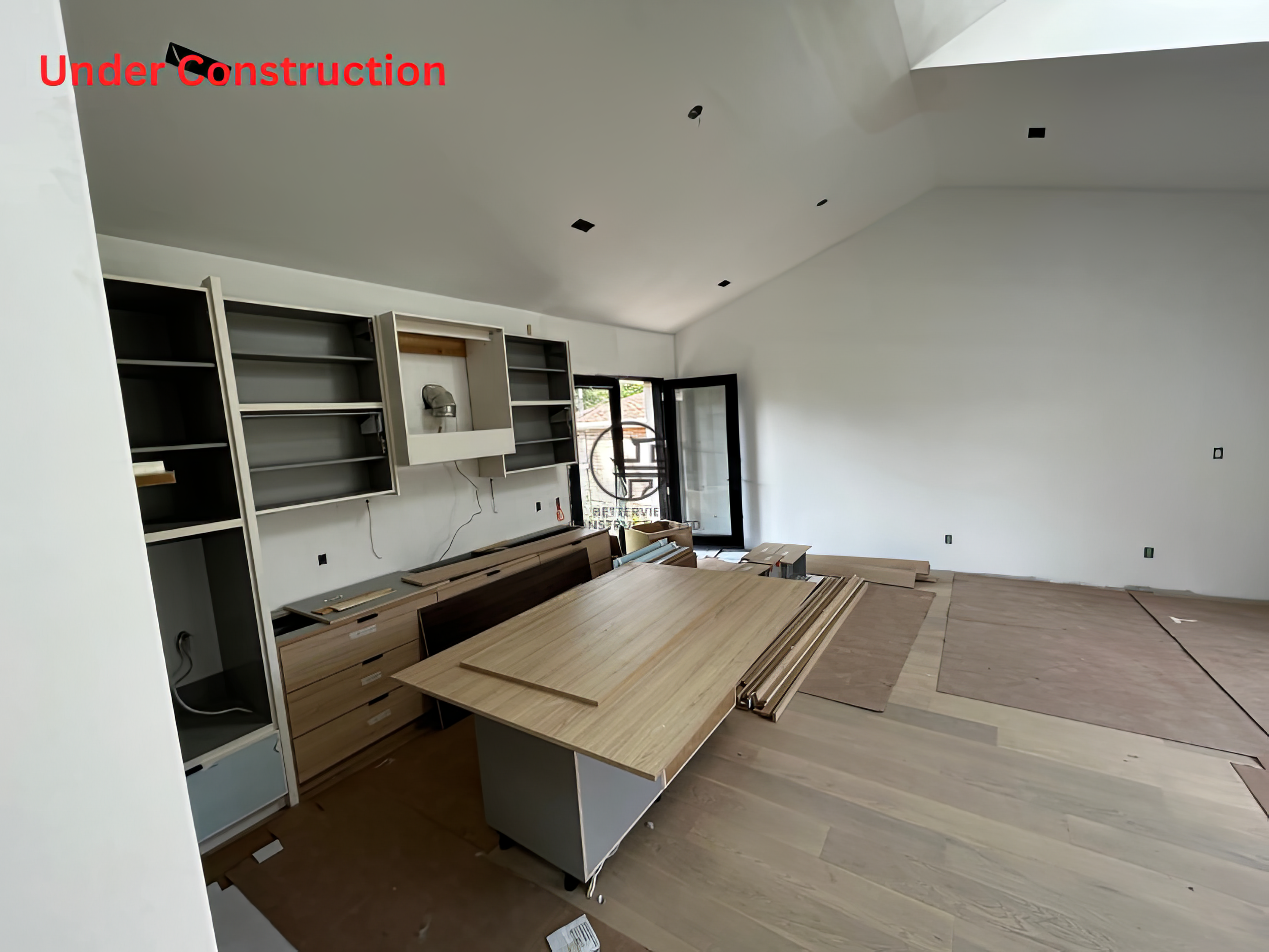 modern-home-renovation-living-room-cabinet-installation-under-construction.jpg.png