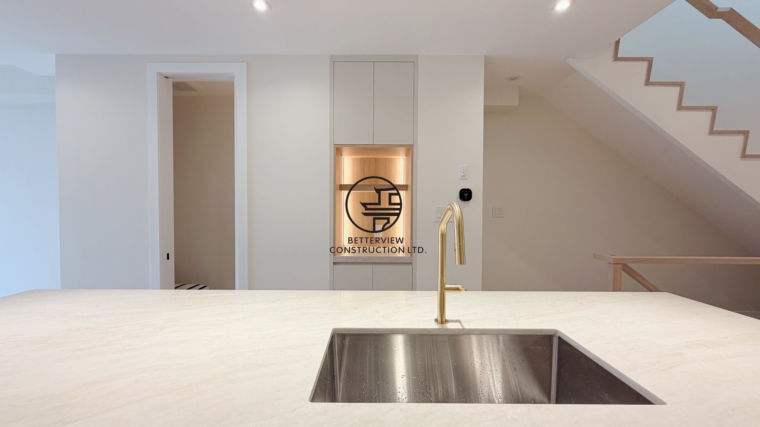 modern-kitchen-island-sink-gold-faucet-open-concept-renovation-toronto.jpg.jpg