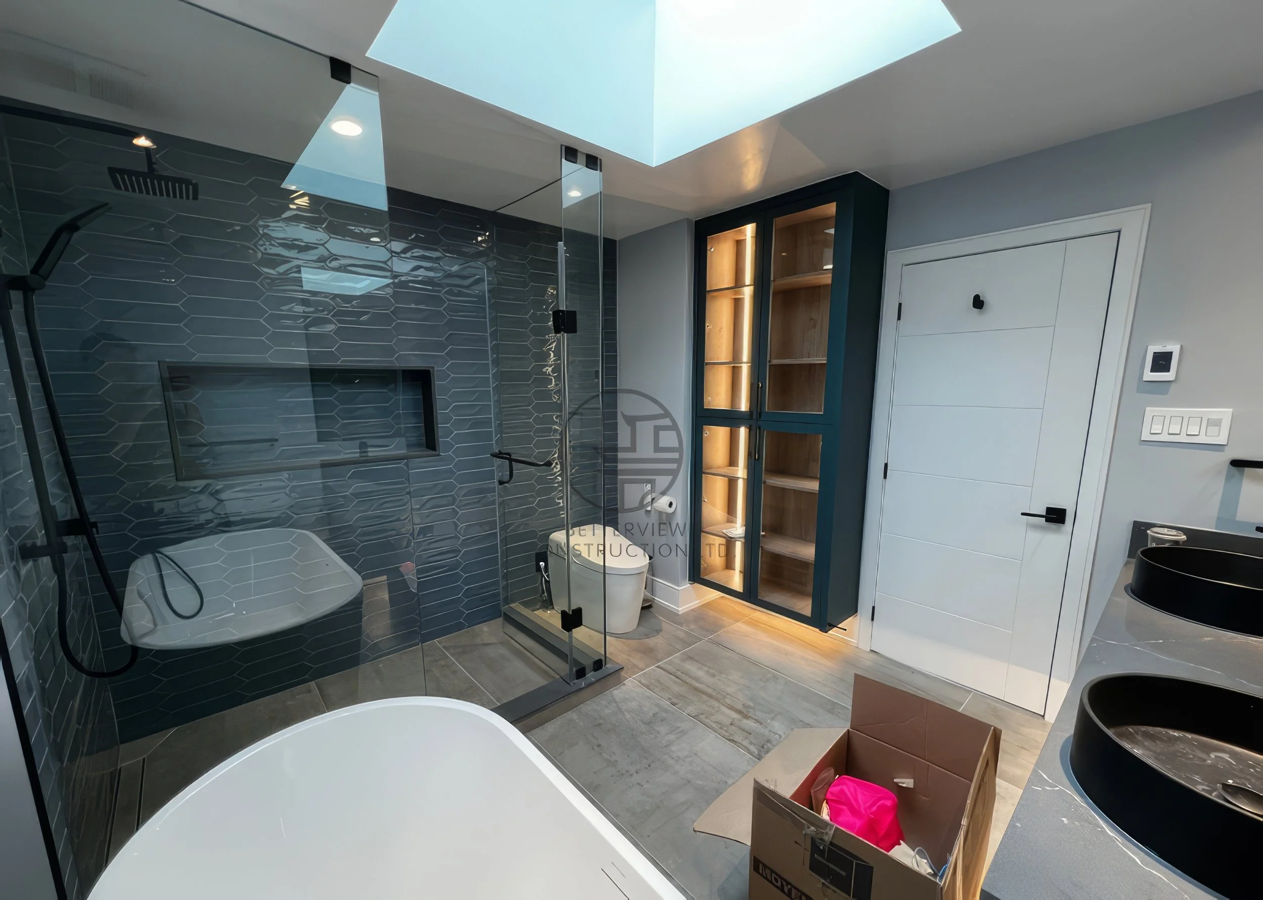 modern-bathroom-renovation-skylight-glass-shower-custom-cabinet.jpg.jpg