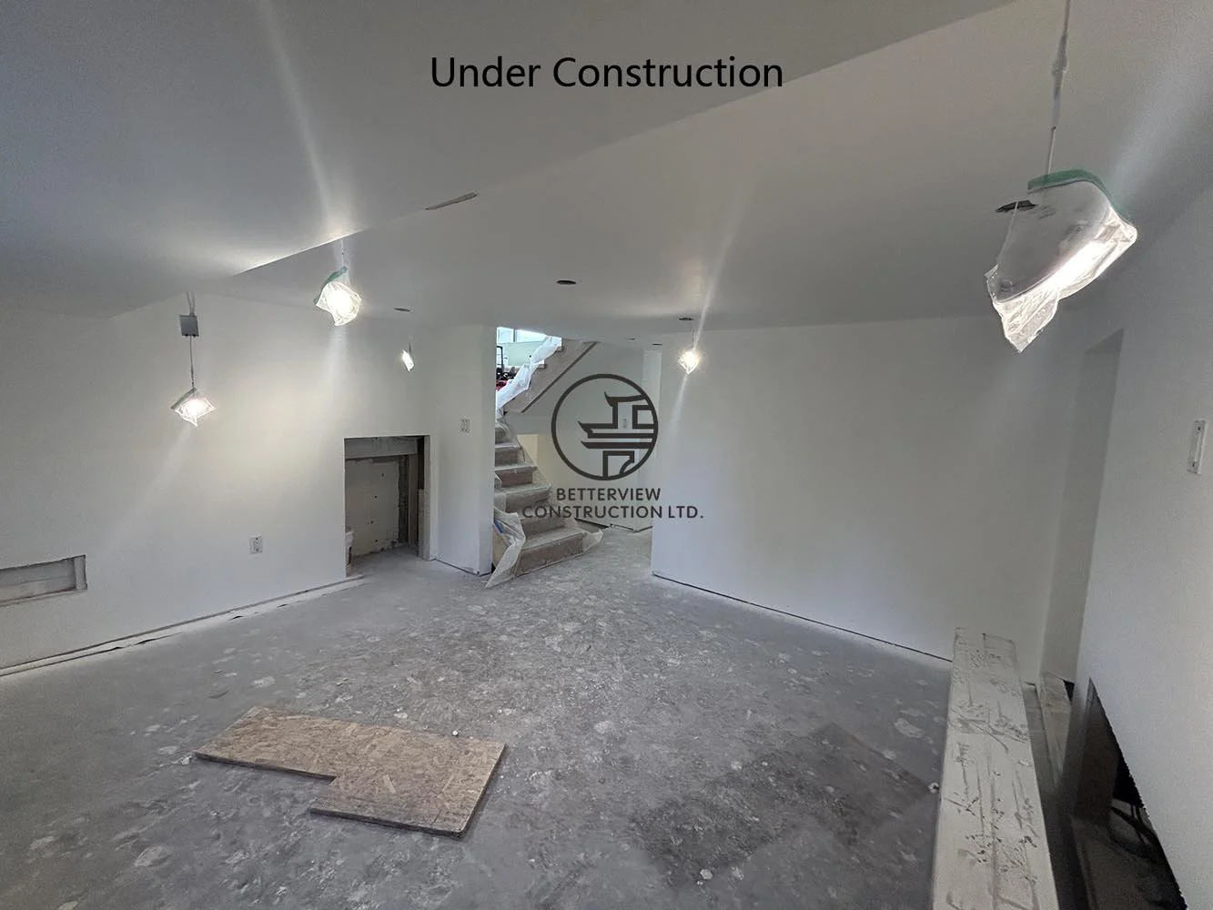 Drywall installation completed for a custom home addition, preparing the interior for painting, flooring, and final finishes.
