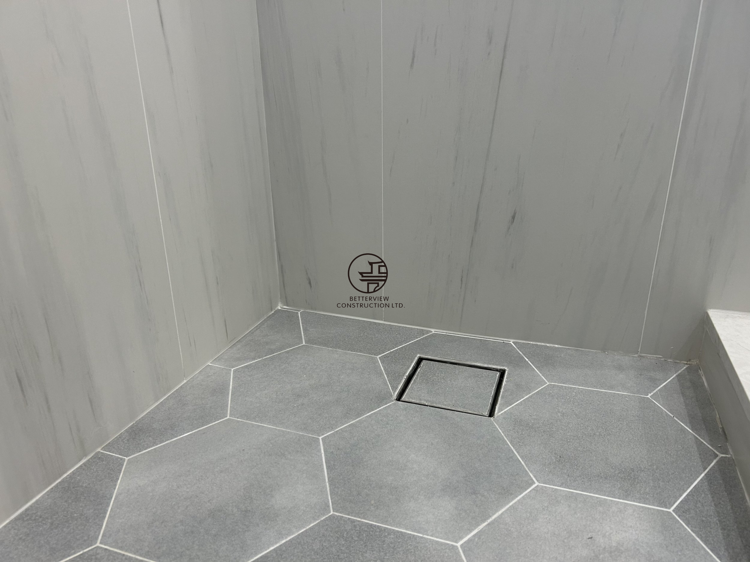 hexagon-shower-floor-tile-square-drain-bathroom-renovation-toronto.jpg.png