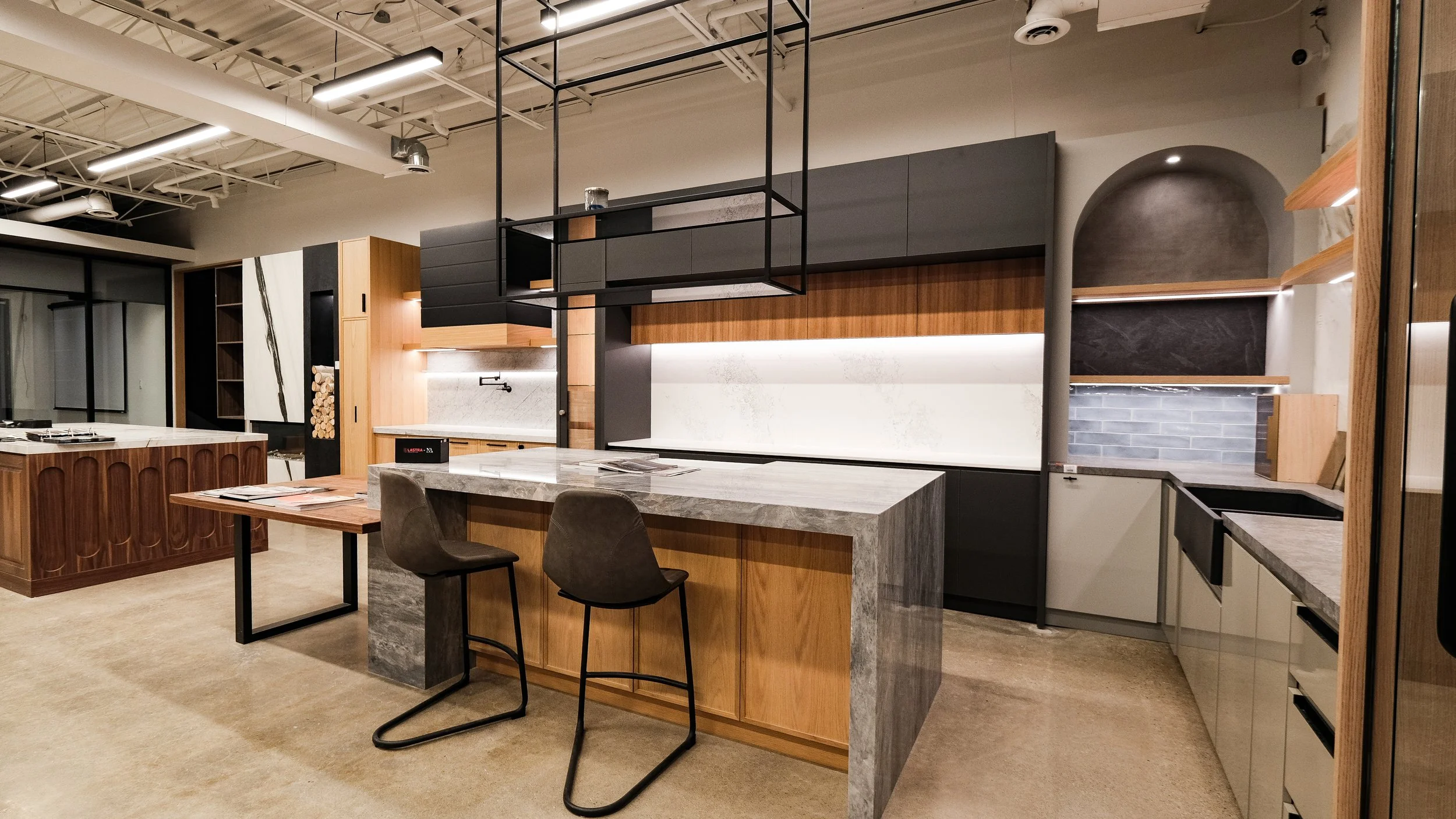 Betterview Construction showroom kitchen display with modern cabinetry, island, and custom millwork in Toronto GTA