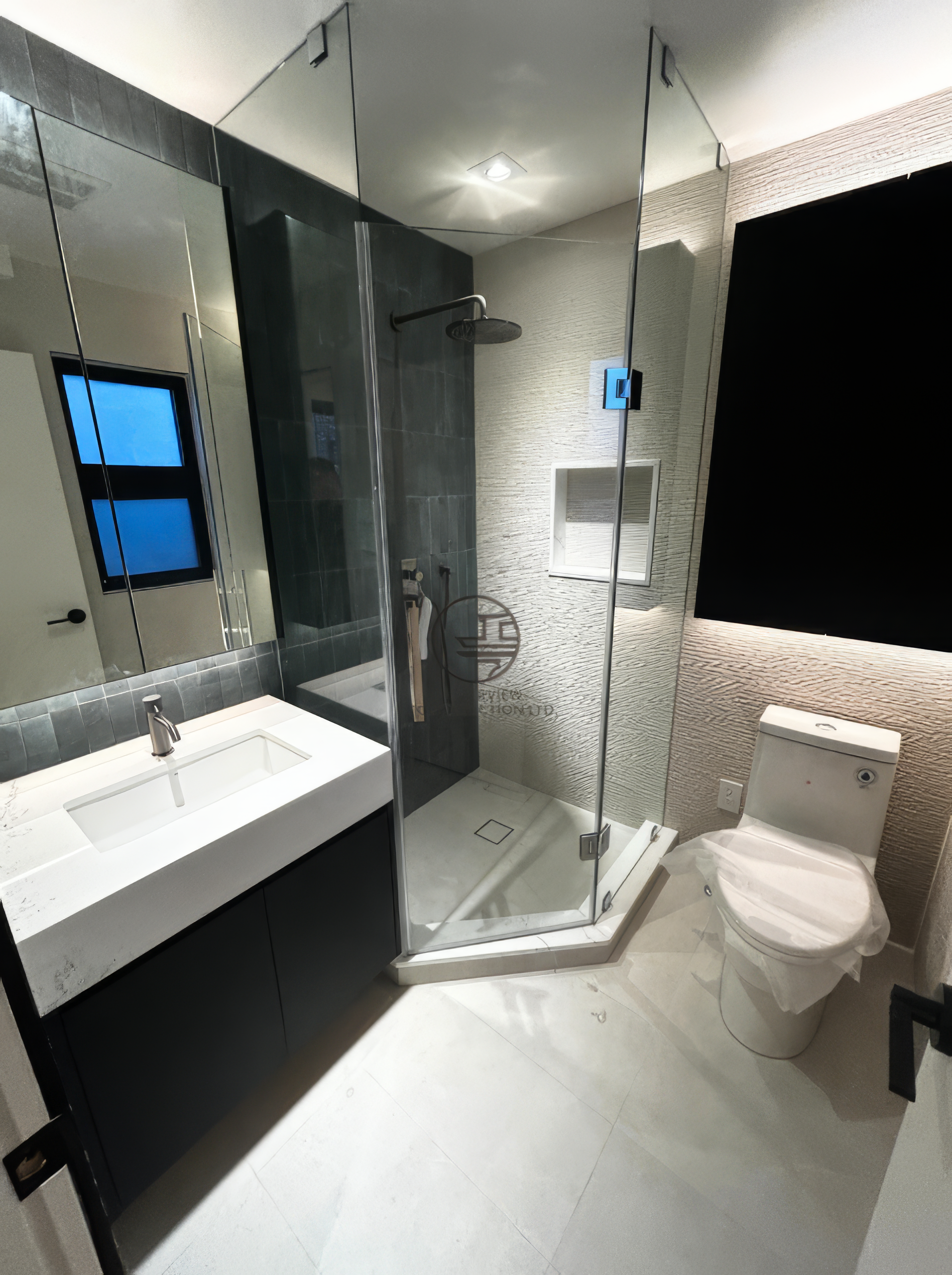 Bathroom renovation in Toronto featuring corner glass shower, black vanity, and modern tile design