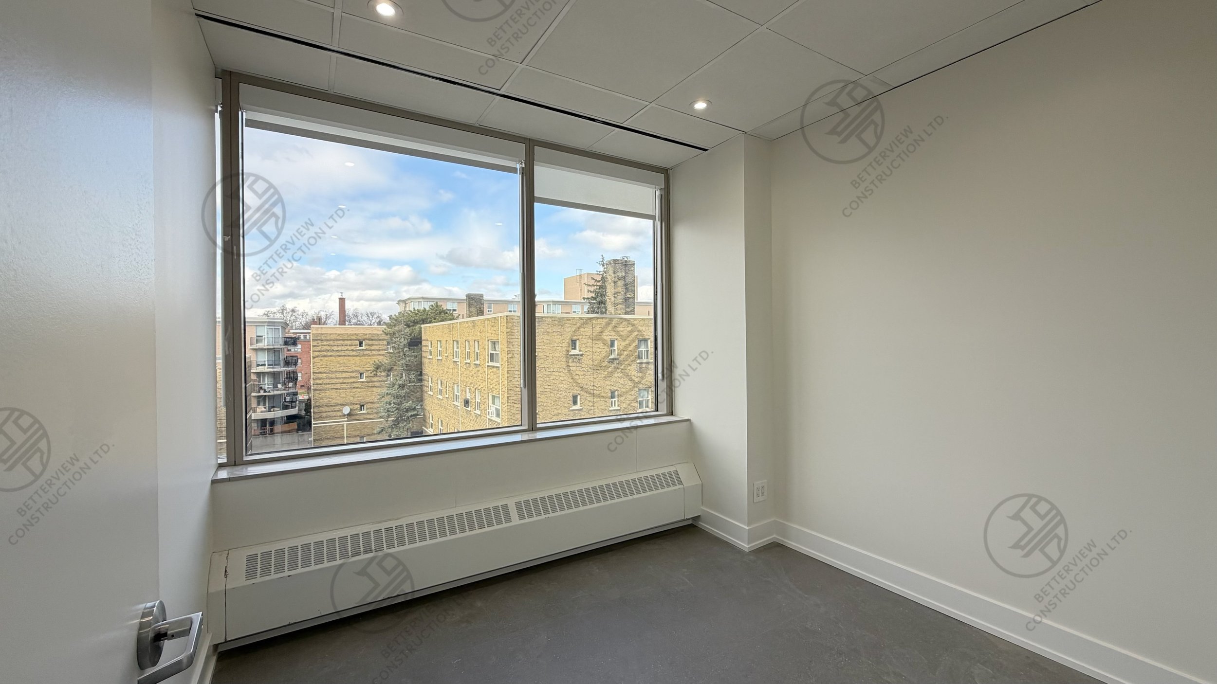 commercial-clinic-renovation-private-room-large-window-city-view.jpg.jpg