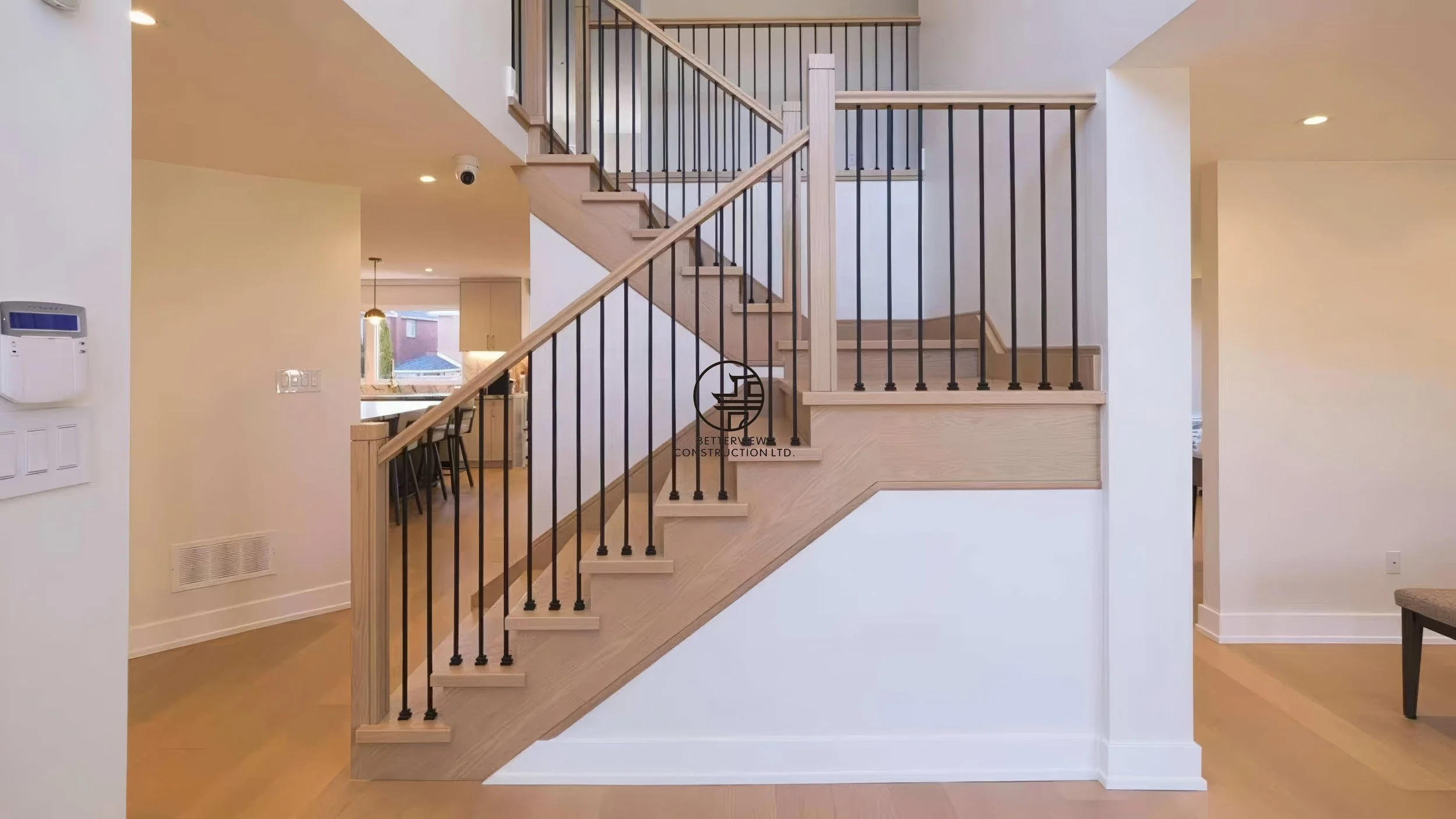 modern-staircase-renovation-wood-stairs-black-metal-railings-open-concept-home-toronto.jpg.jpg