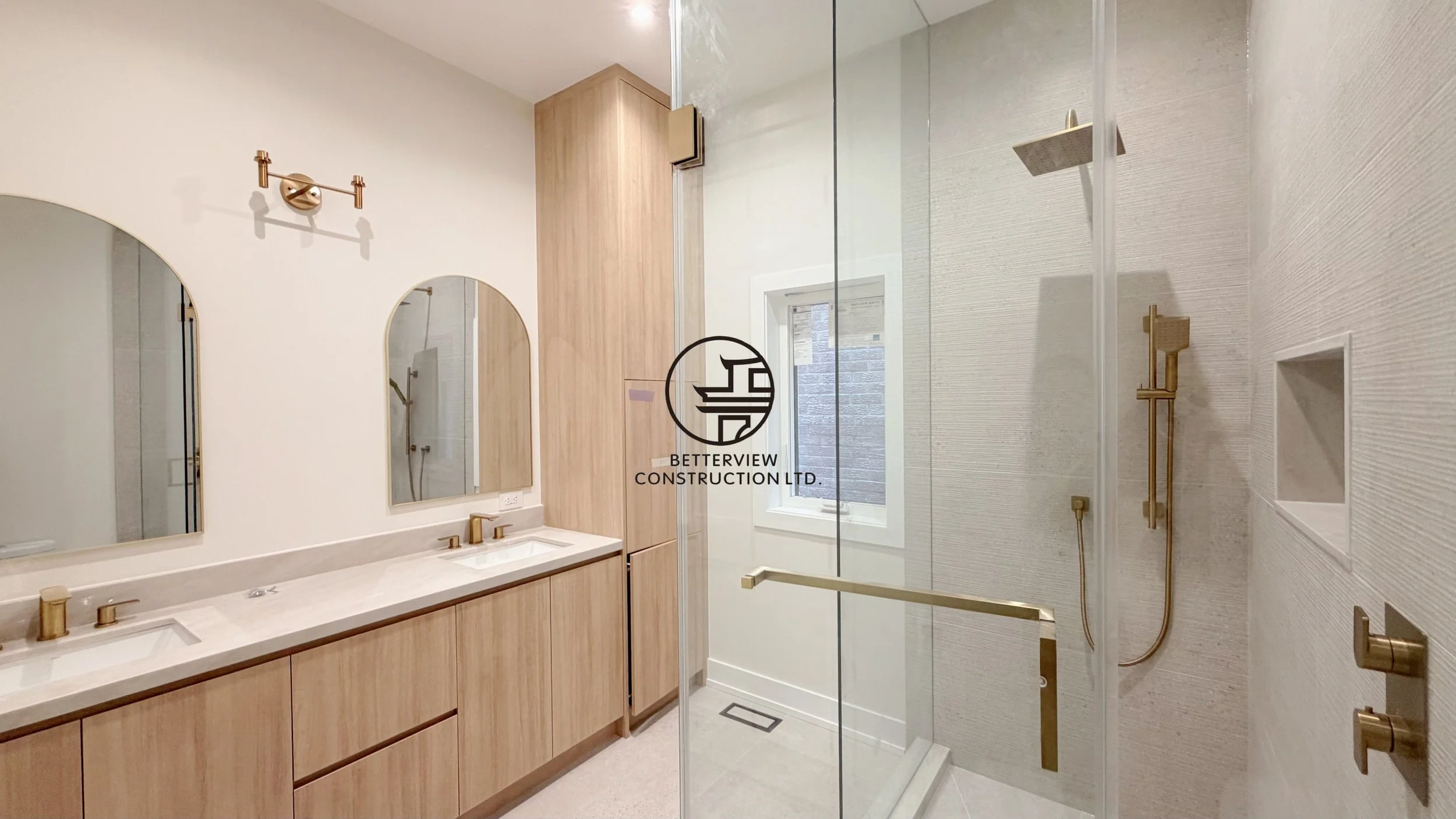 luxury-bathroom-renovation-double-vanity-glass-shower-gold-fixtures-toronto.jpg.jpg
