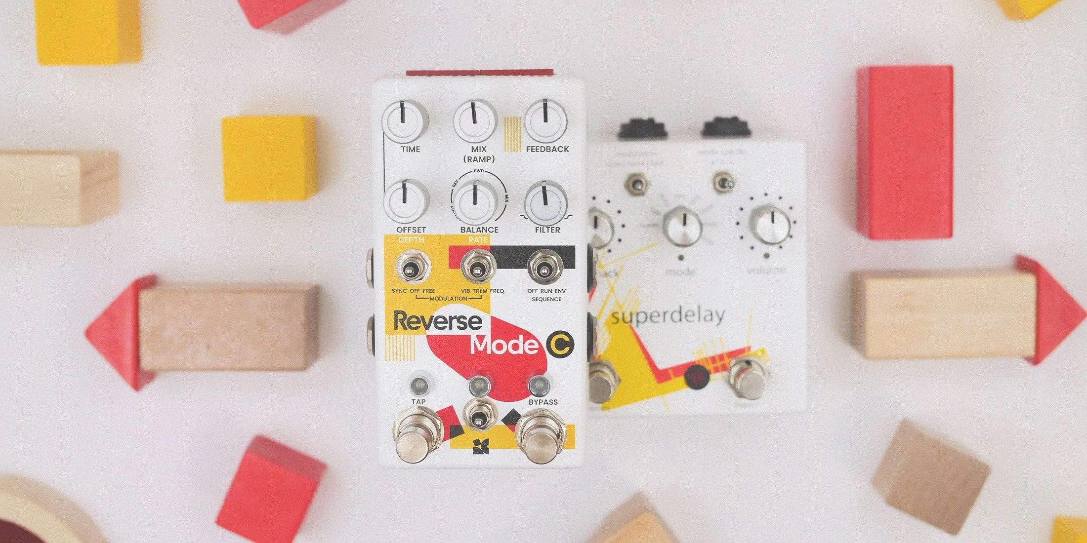 Reverse Mode C effects pedal by Chase Bliss on top of Superdelay pedal by Empress Effects.