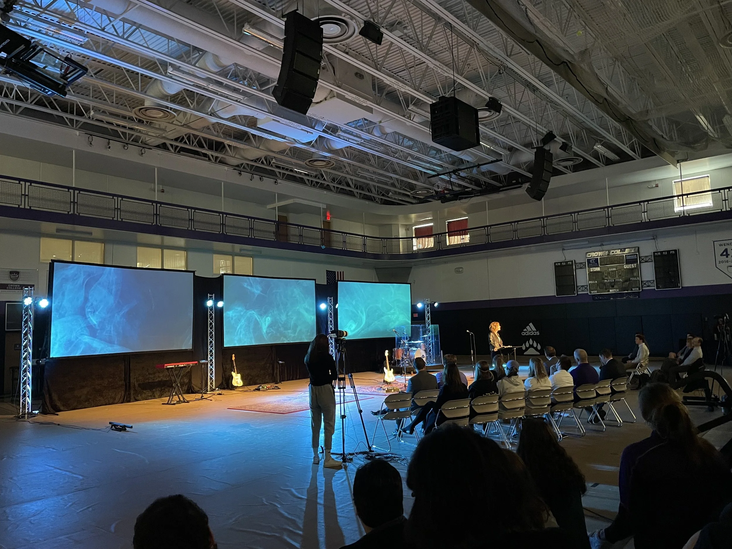 After installation, you can see the line arrays and subwoofer installed in the rafters. This not only provided much higher quality audio and better distribution of audio, it also cleaned up the stage.