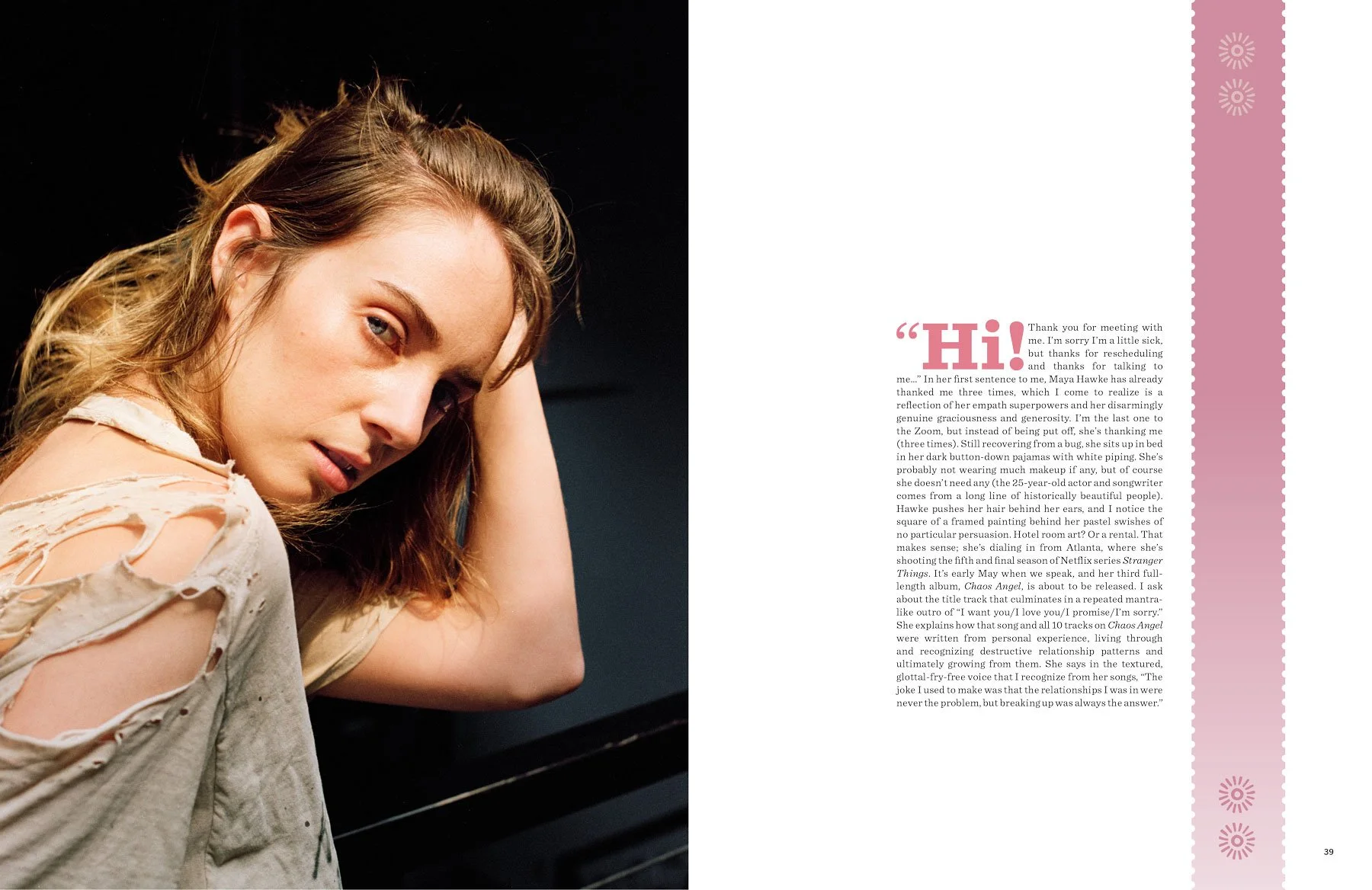 A young woman with light brown hair and fair skin, wearing a distressed and torn beige shirt, resting her head on her hand, looking at the camera with a neutral expression, against a dark background.