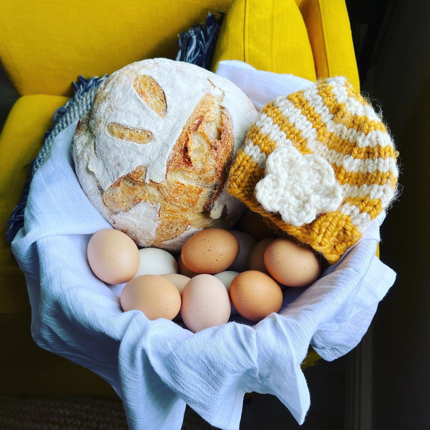 A postpartum gift for my latest Mama. Fresh eggs from our chickens, homemade sourdough, and a baby hat that I knit. Turns out because I hate to check my gauge before I start and it&rsquo;s a new pattern that the hat will fit her in about 6 mo. But th
