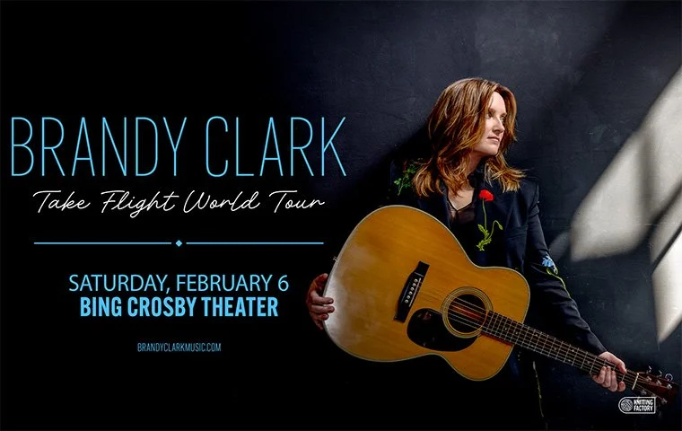 020627 - Brandy Clark - Take Flight World Tour | Bing Crosby Theater | image of Brandy Clark Holding her Guitar on black background.