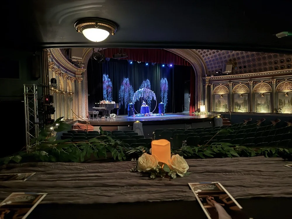 Stage and table set up in theater