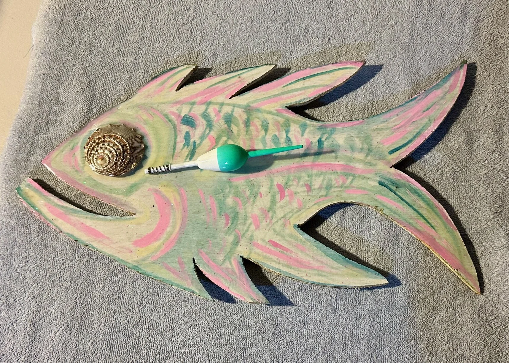 Glow green white float. $50. 
9" X 16"