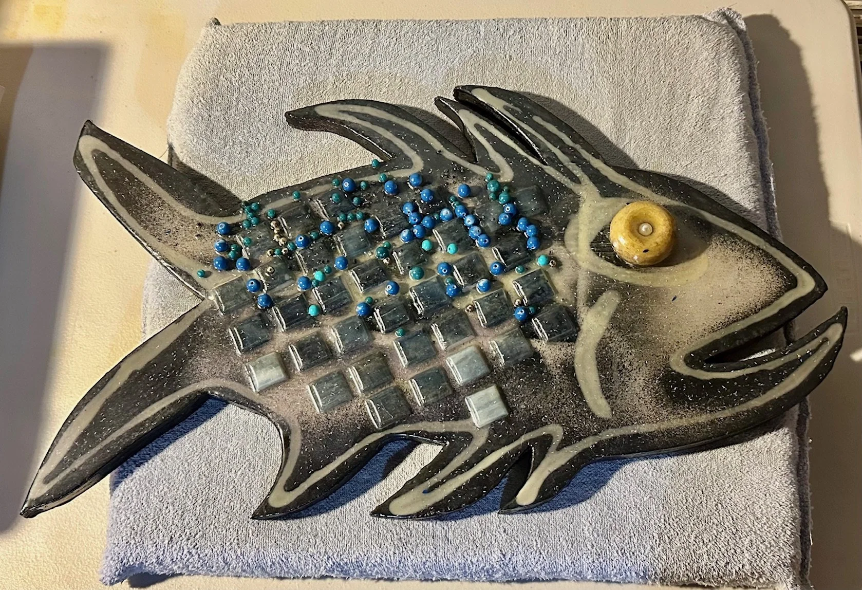 Glow tile fish.  $165.
14" X 24"