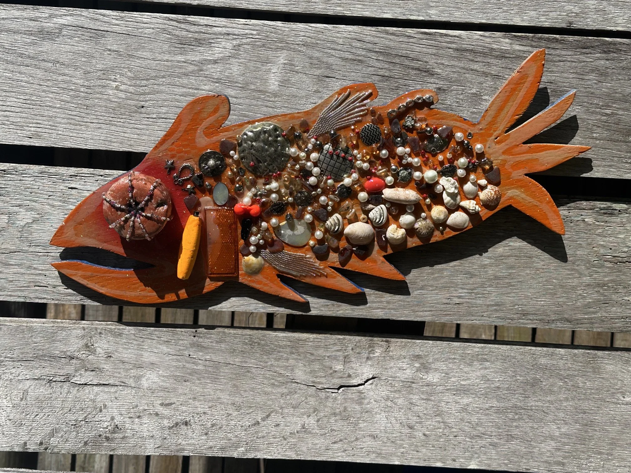 Burnt Orange Glow Reflector Gill
25" X 10"  $175