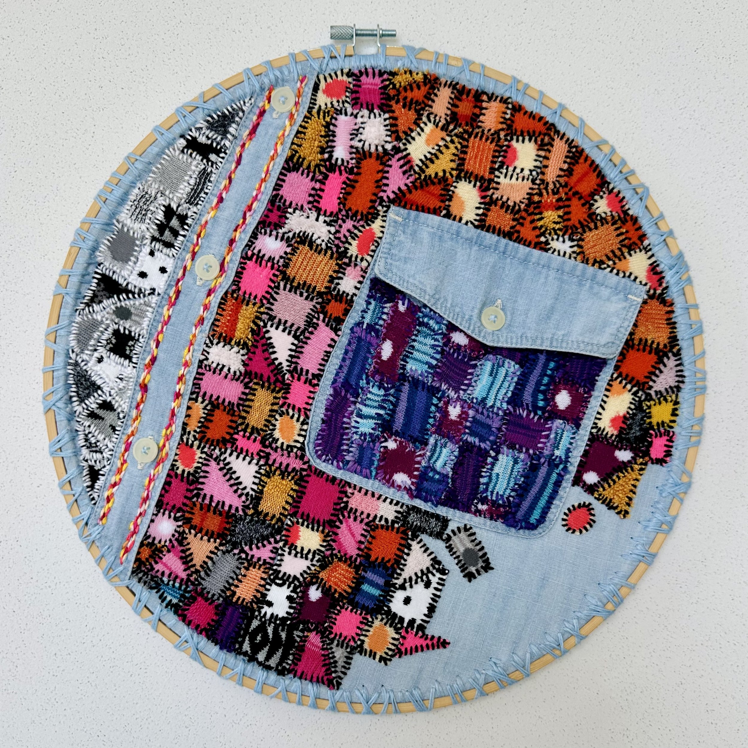 Truth Inside (2023) embroidery thread on old shirts and socks 12.5" disc $