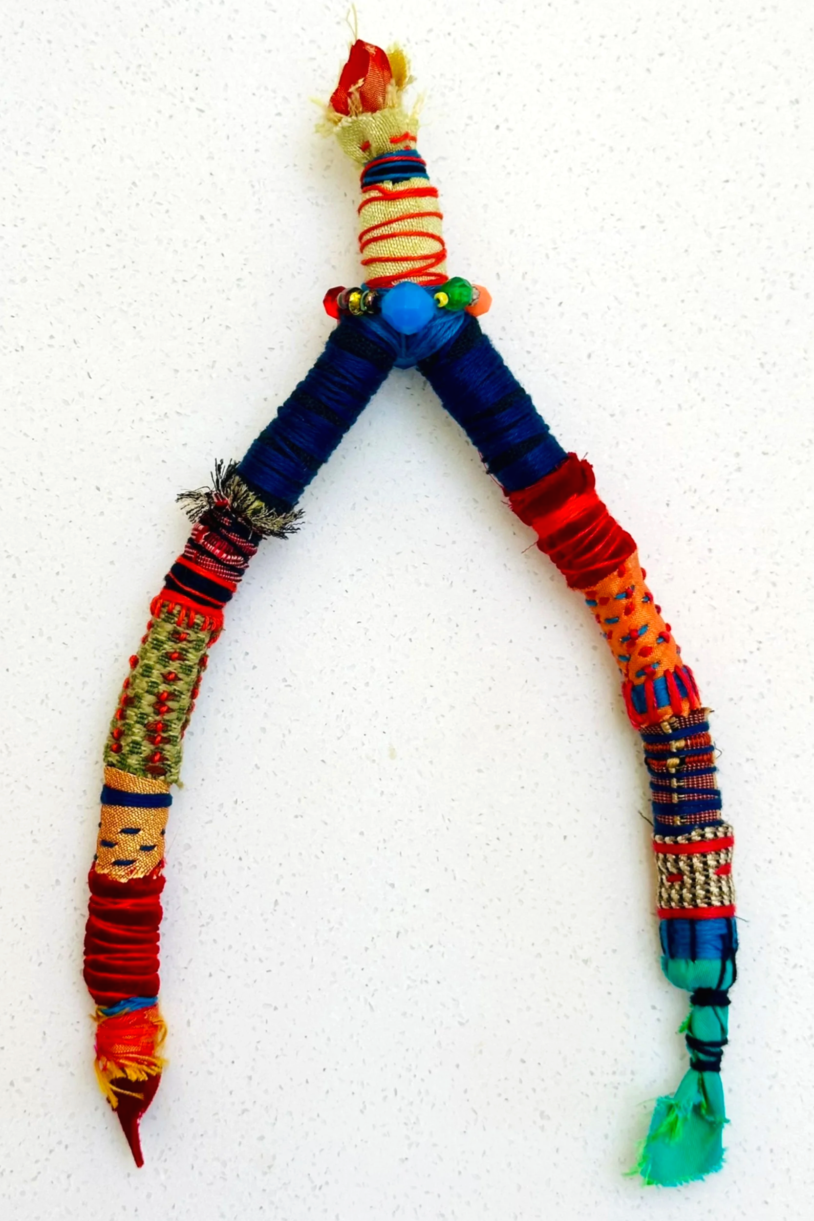 So Many Wishes...   (2025)   felt, upcycled fabric, beads, Sashiko thread, embroidery thread   8" x 4" x 1.25"  