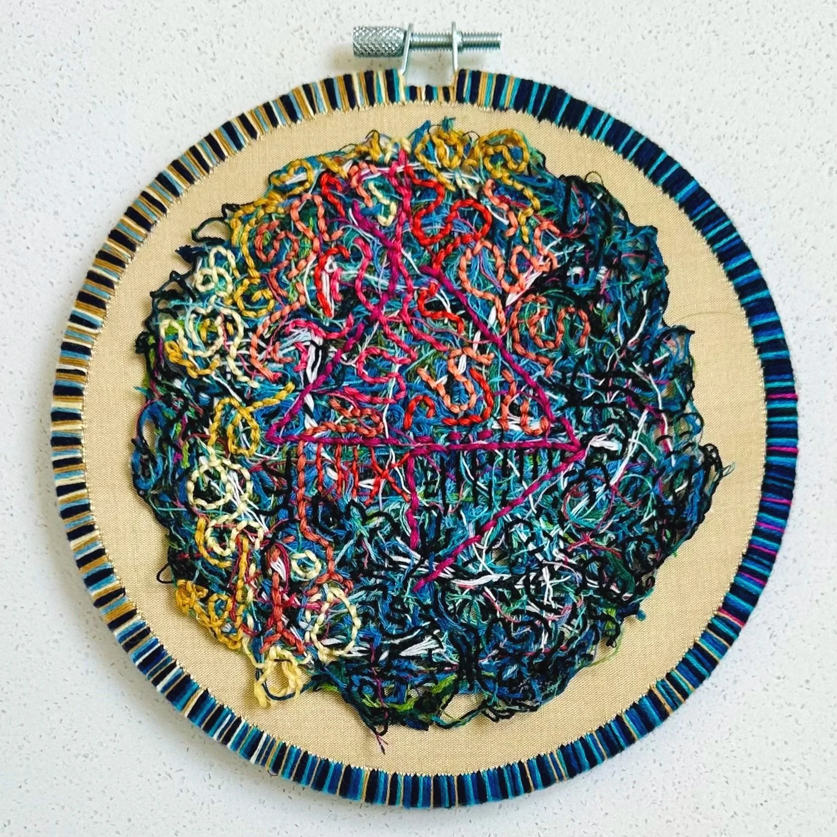 Inside Spark   (2025)   Sashiko thread and embroidery thread on upcycled fabric   6.5"   $450